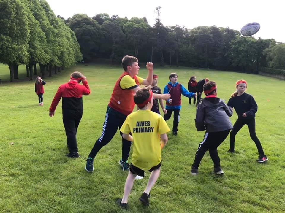 Pupils taking part in a rugby festival at Grant Park, Forres, in May. Attendees from Alves, Dallas, Dyke, Kinloss and Logie primary schools enjoyed six-a-side games.
