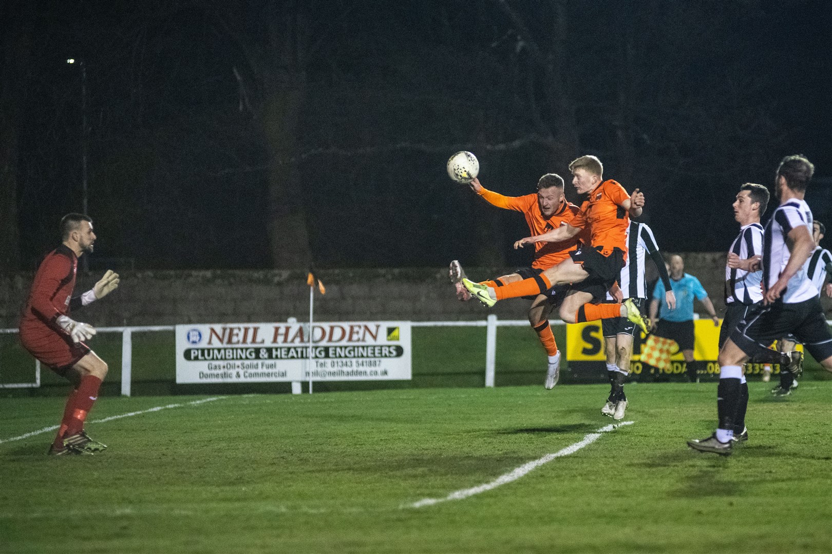 A Rothes chance goes a miss after a mix up between Rothes' Ewan McLauchlan and Ross Gunn...Rothes FC (1) vs Fraserburgh FC (2) - GPH Builders Merchants Highland League Cup - Mackessack Park, Rothes 02/03/2022...Picture: Daniel Forsyth..