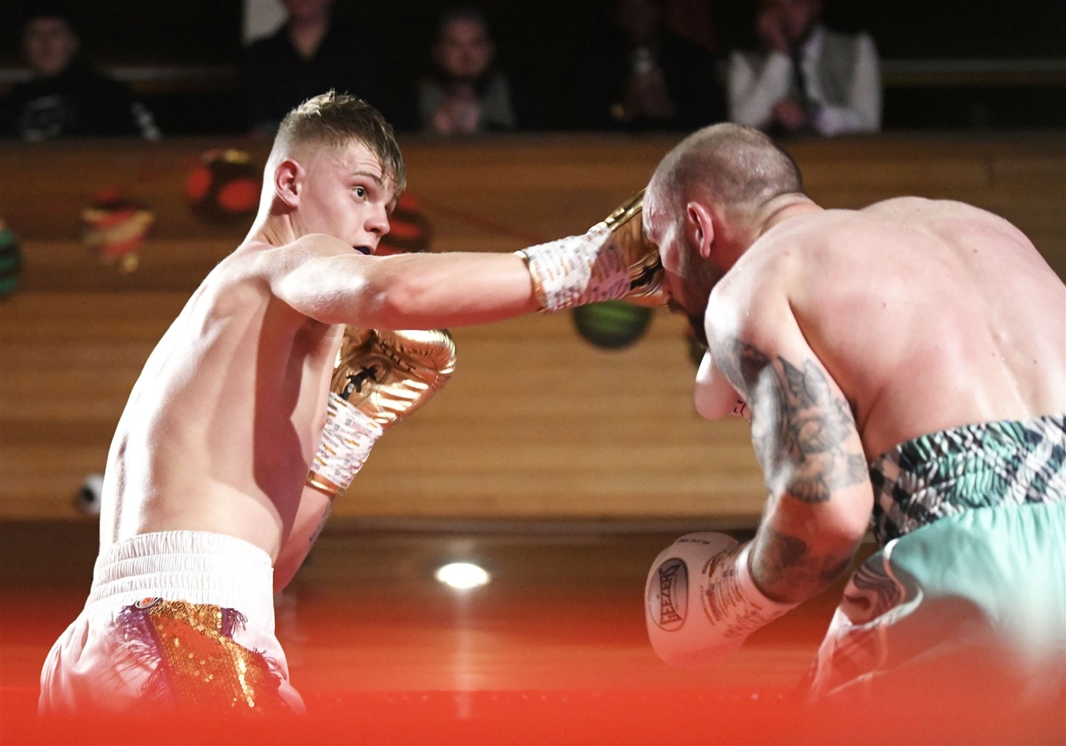 Corey McCulloch couldn't avoid Fraser Wilkinson's punch...Scottish professional Super Welterweight Title at Elgin Town Hall, December 17th 2022. ..Picture: Beth Taylor.
