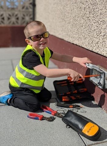 Forbes McFadden, who's aged 6 and comes from Elgin, is learning about the construction industry.