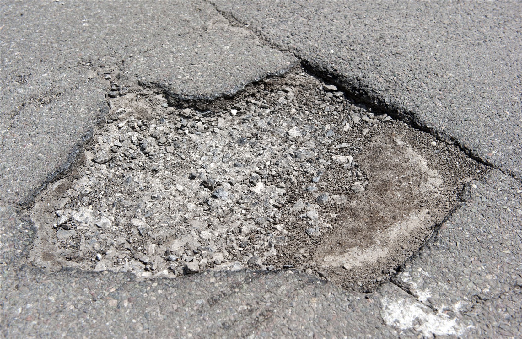Funding to fix potholes across England will be boosted by £200 million (Tim Goode/PA)