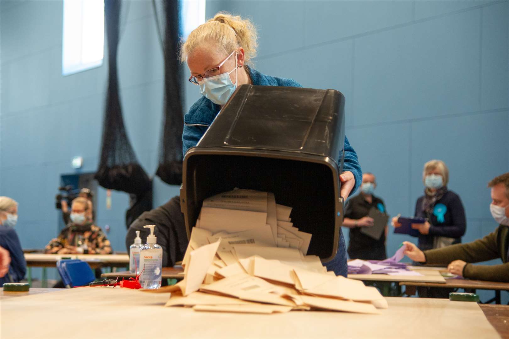 The first ballots are poured out at Moray Sports Centre. Picture: Daniel Forsyth