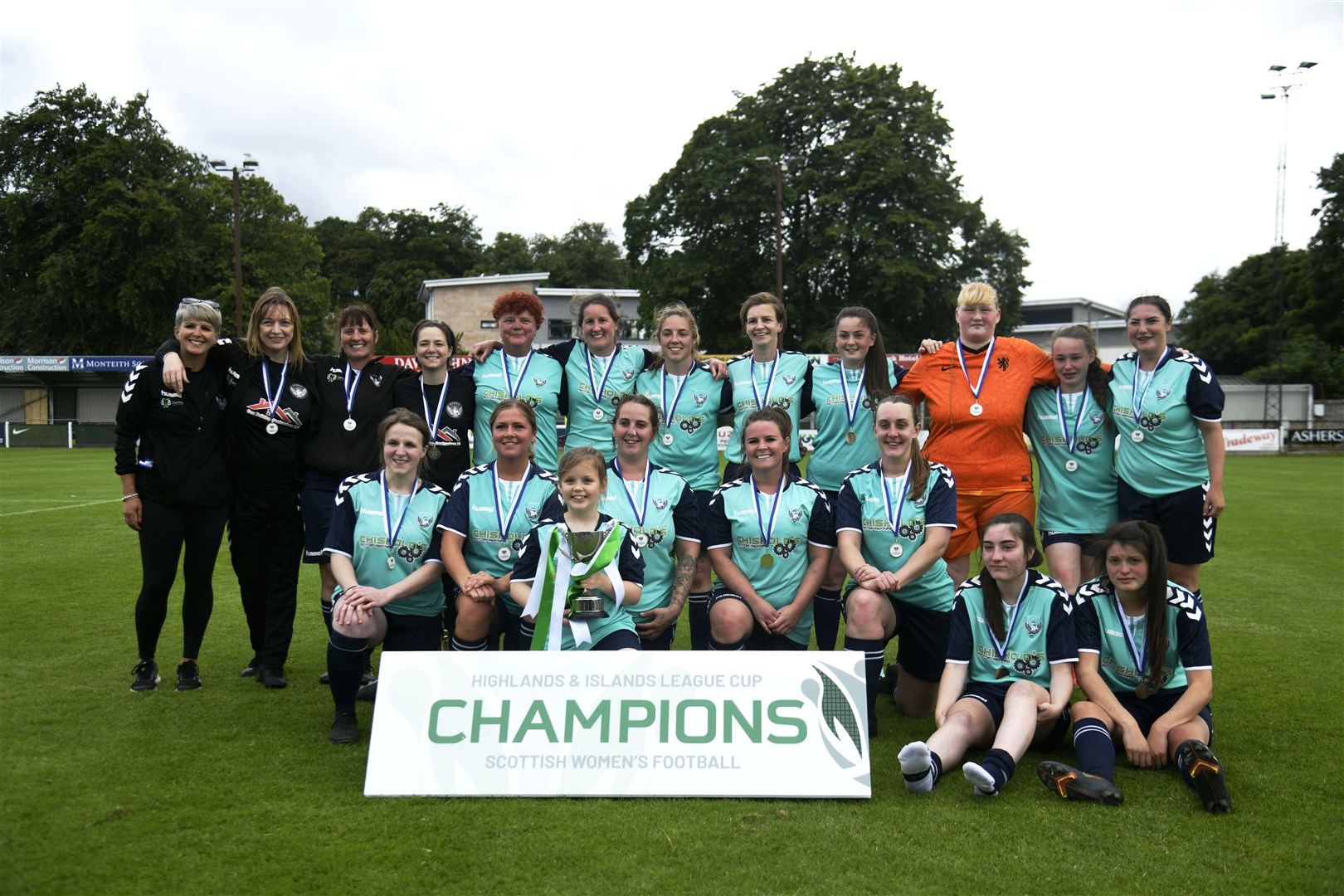 Buckie Ladies FC celebrate their cup final victory in July – they have now added the league title to their trophy cabinet. Picture: Beth Taylor