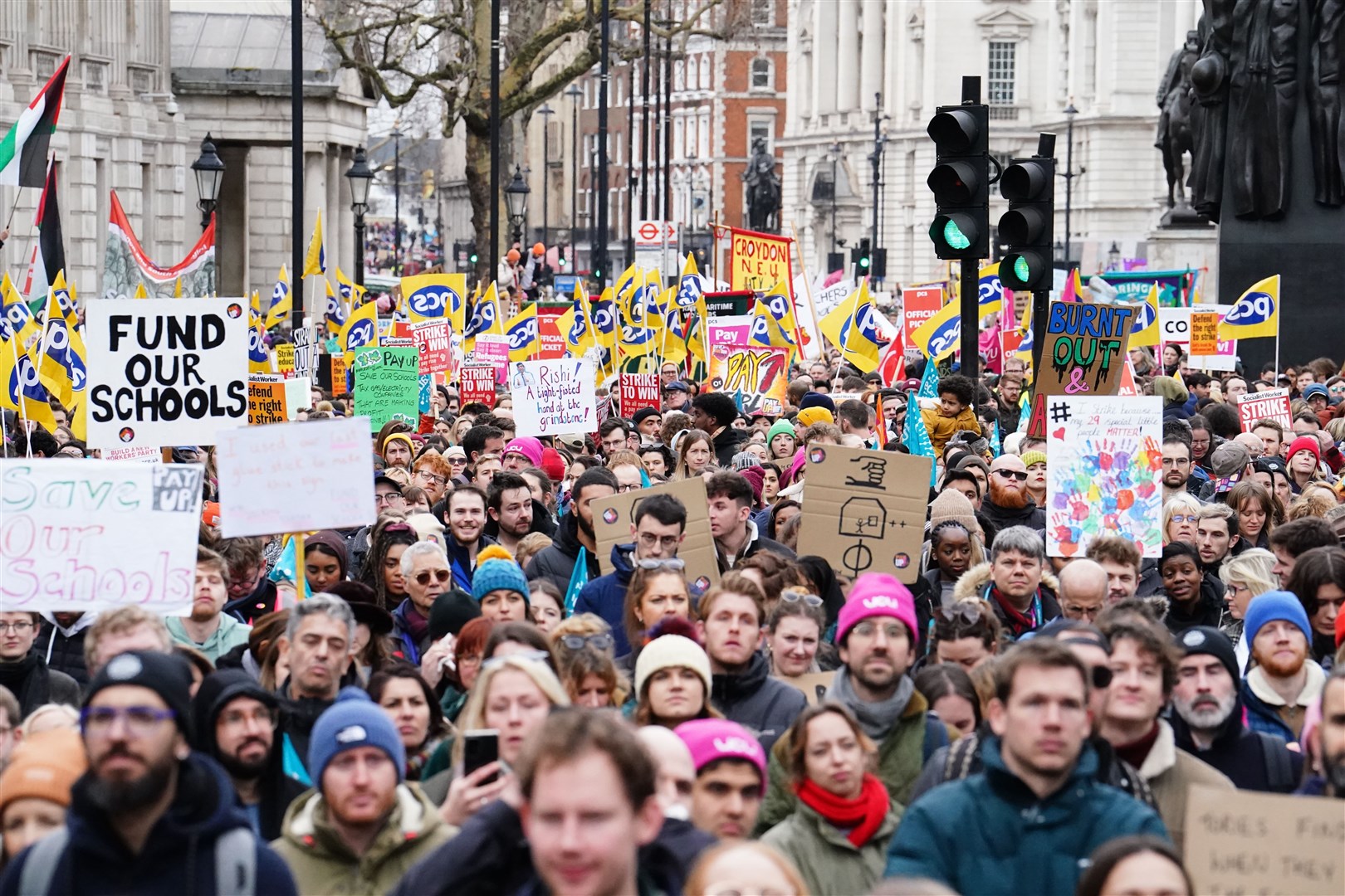 Striking members and supporters of the NEU march from Portland Place to Westminster (Jordan Pettitt/PA)