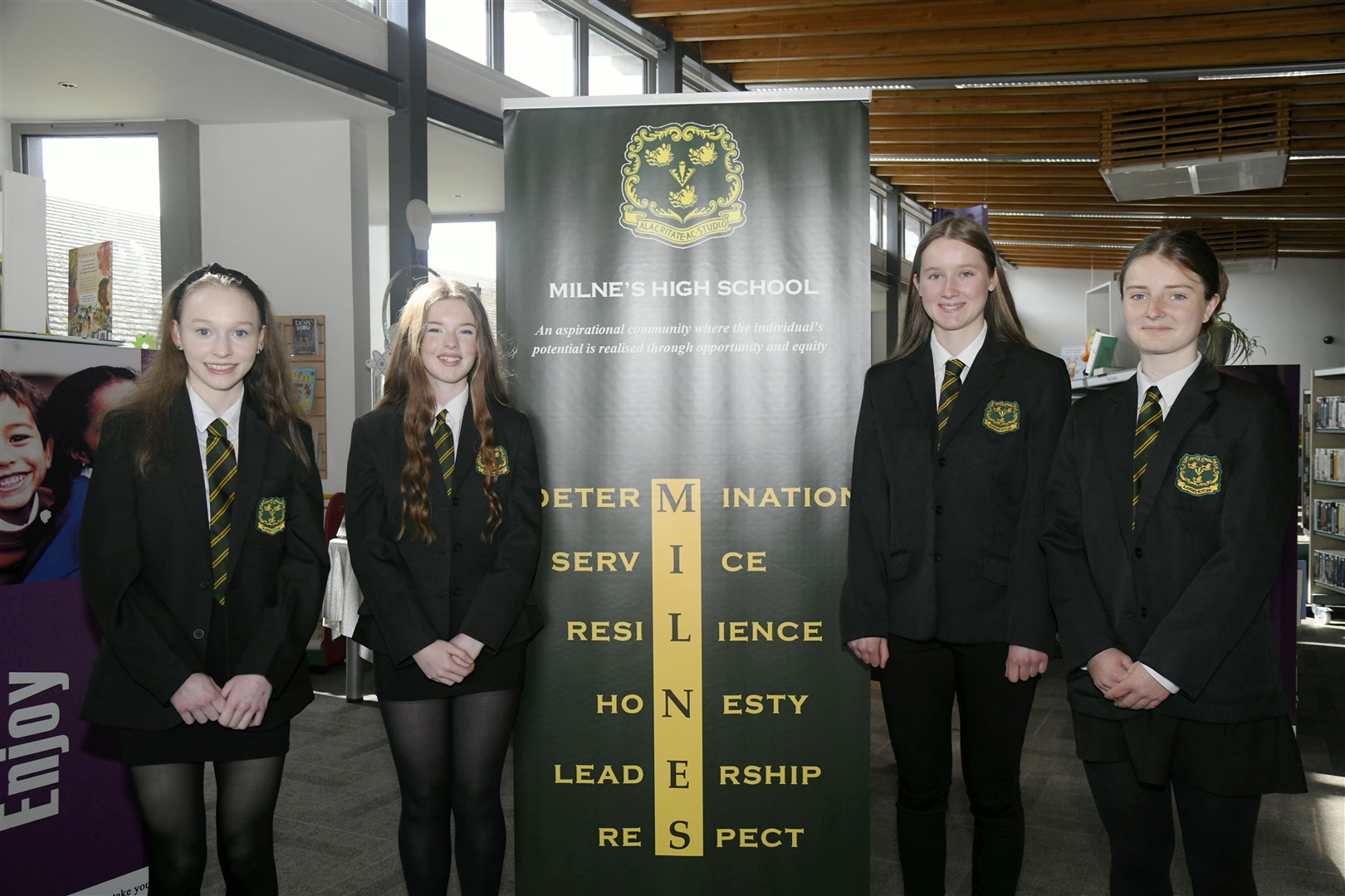 Nat 5 result record breaker Hebe Muckle (right) is joined by classmates Eva Melrose (let), Ellie Thomson-Bialy (second left) and Eilidh Hay in celebrating their exam results. Picture: Beth Taylor