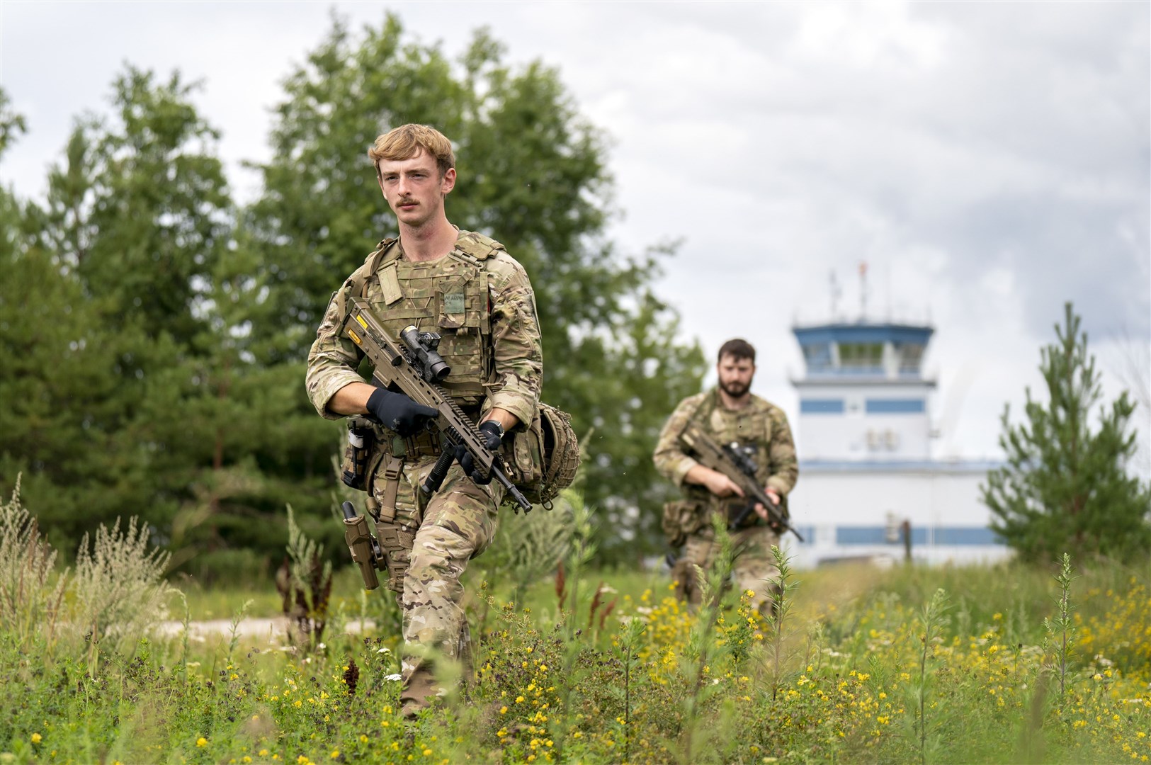 Air RAF Specialist 1 Harrison Malkin, left, and Air Specialist 1 Harry Walker carry out internal security checks during deployment on Operation Azotize (Jane Barlow/PA)
