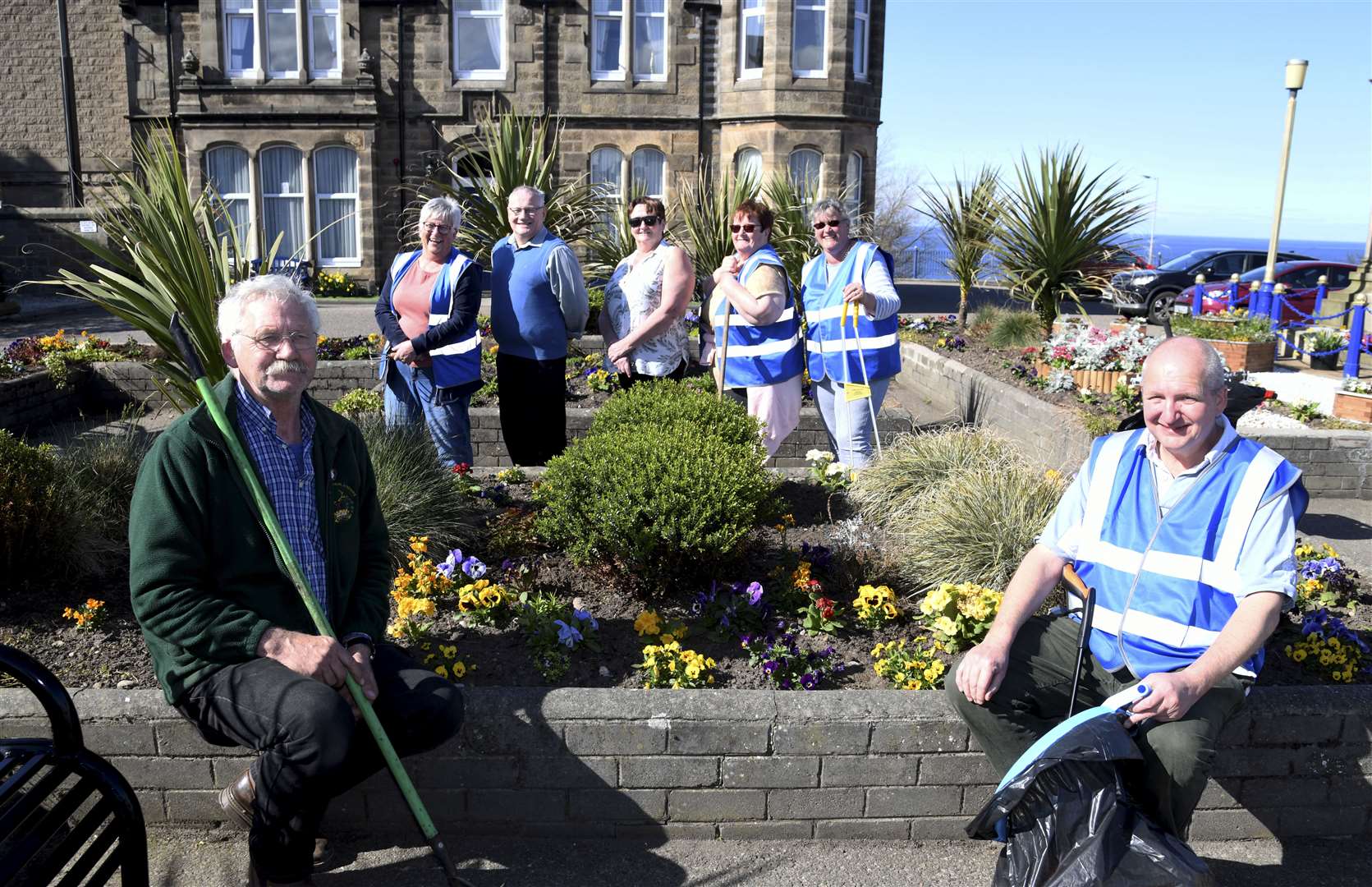 Helping keep Cluny Square beautiful – (from left) Archie Jamieson, Evelyn Flett, Gifford Leslie, Morag Stewart, Meg Jamieson, Maria and David Chambers. Picture: Becky Saunderson