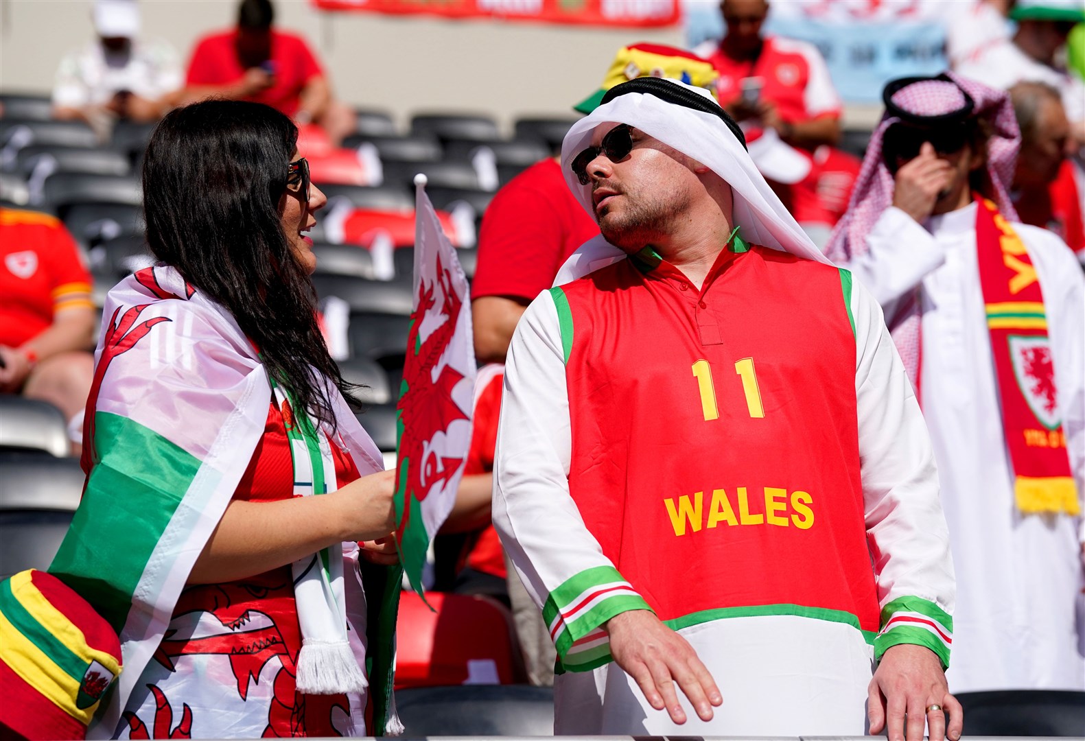 Wales fans in the stands at the Ahmad Bin Ali Stadium ahead of the match against Iran (Adam Davy/PA)
