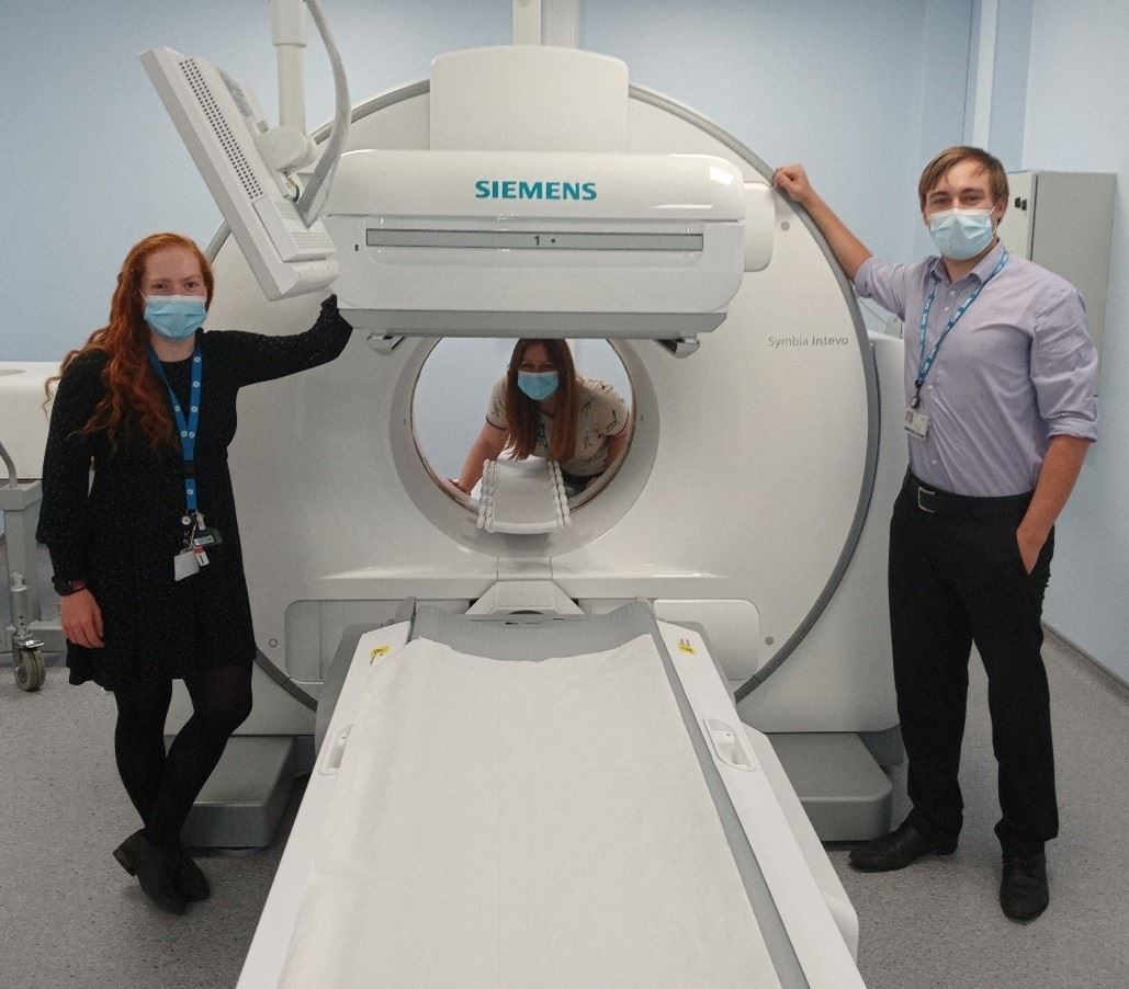 Clinical scientists (from left) Jennifer McCormick, Margo-Rose McNab and Mark Pether with the IQ SPECT CT scanner at ARI.