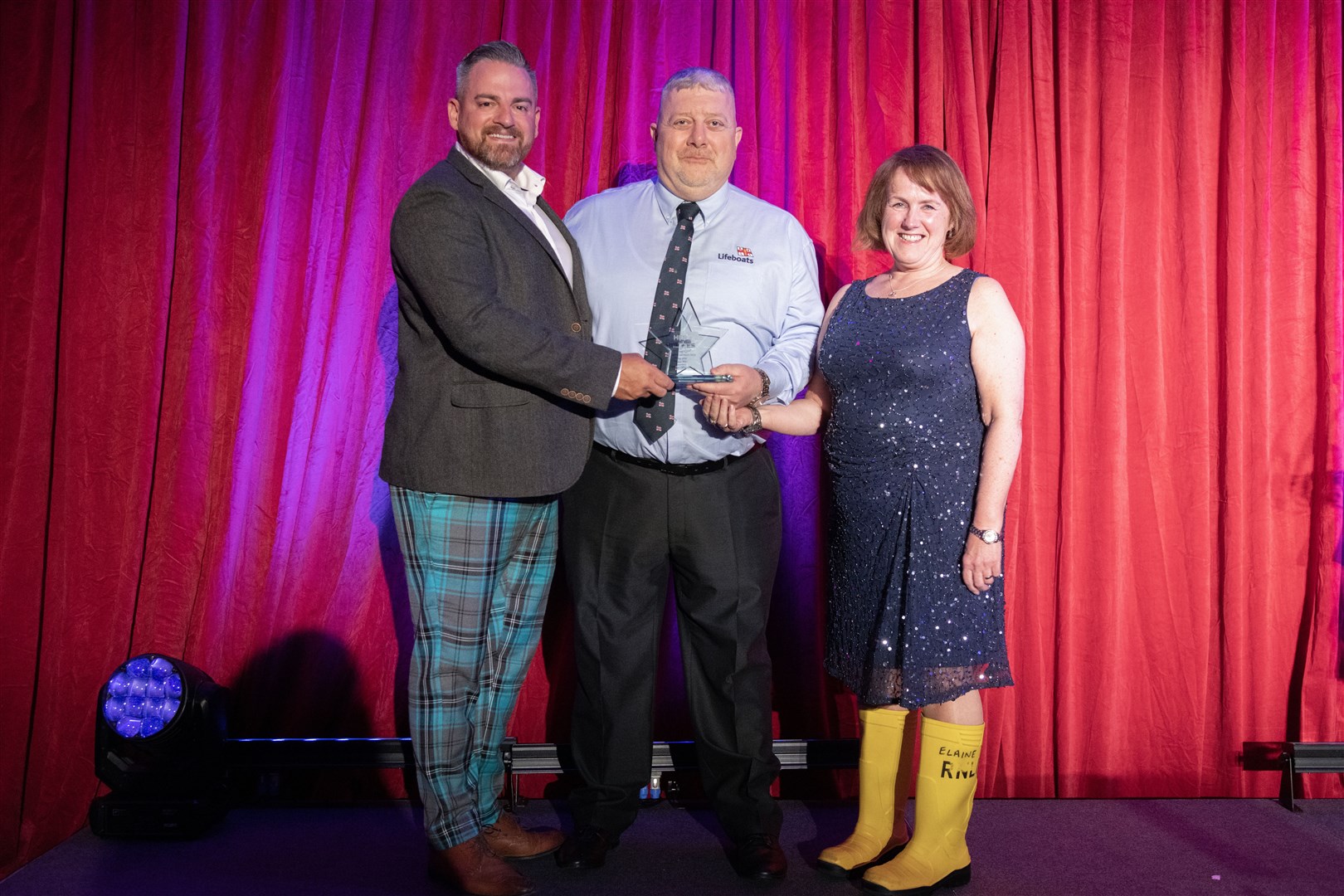 Buckie RNLI was awarded Emergency Services of the Year which was presented by Dave Acton (left), CEO of Motive Offshore to Davie Grant and Anne Scott. Picture: Beth Taylor.