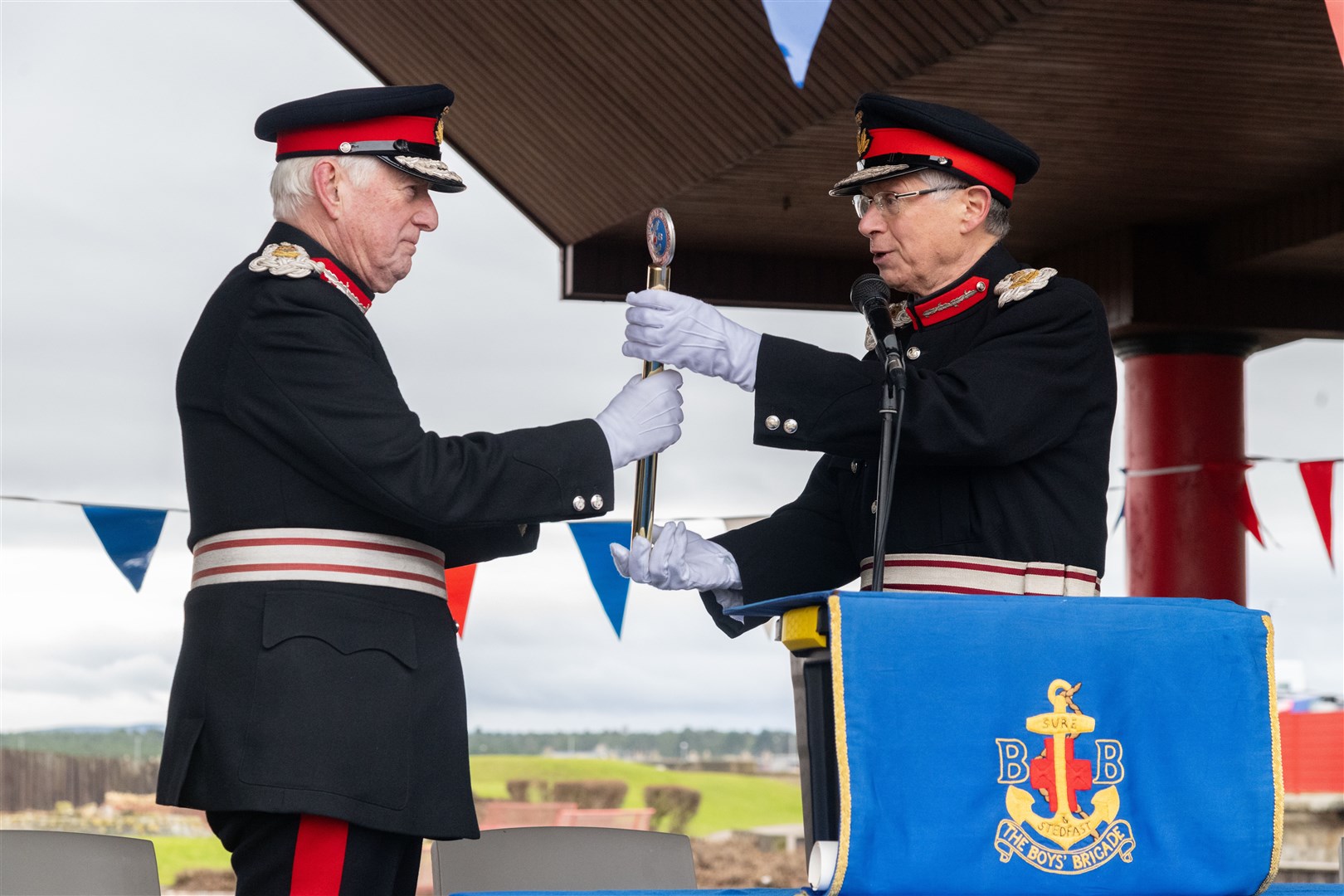 Lord-Lieutenant of Moray Seymour Monro receives the King's Baton from the Lord-Lieutenant of Banffshire Andrew Simpson...Boys' Brigade 140th anniversary in Lossiemouth...Picture: Beth Taylor.
