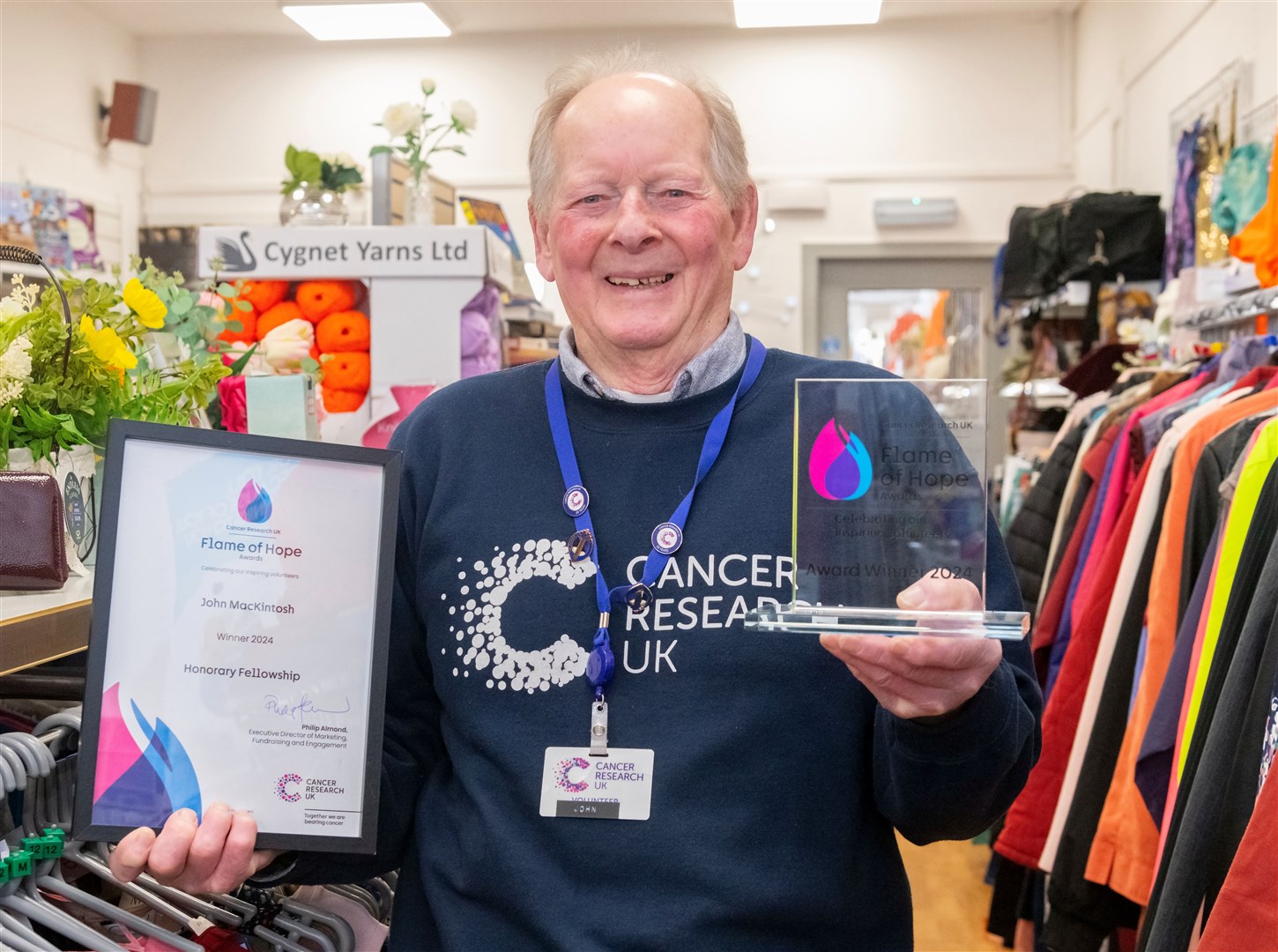 John MacKintosh, from Cancer Research in Elgin, with his award. Picture: Beth Taylor