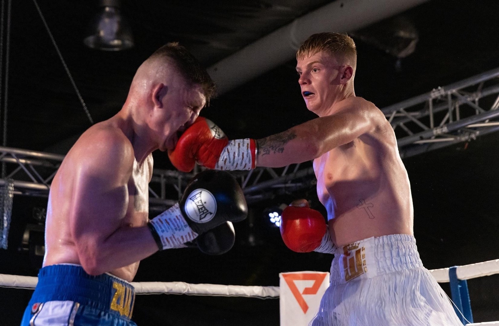Fraser Wilkinson lands a punch on Kristaps Zulgis. Picture: David Rothnie