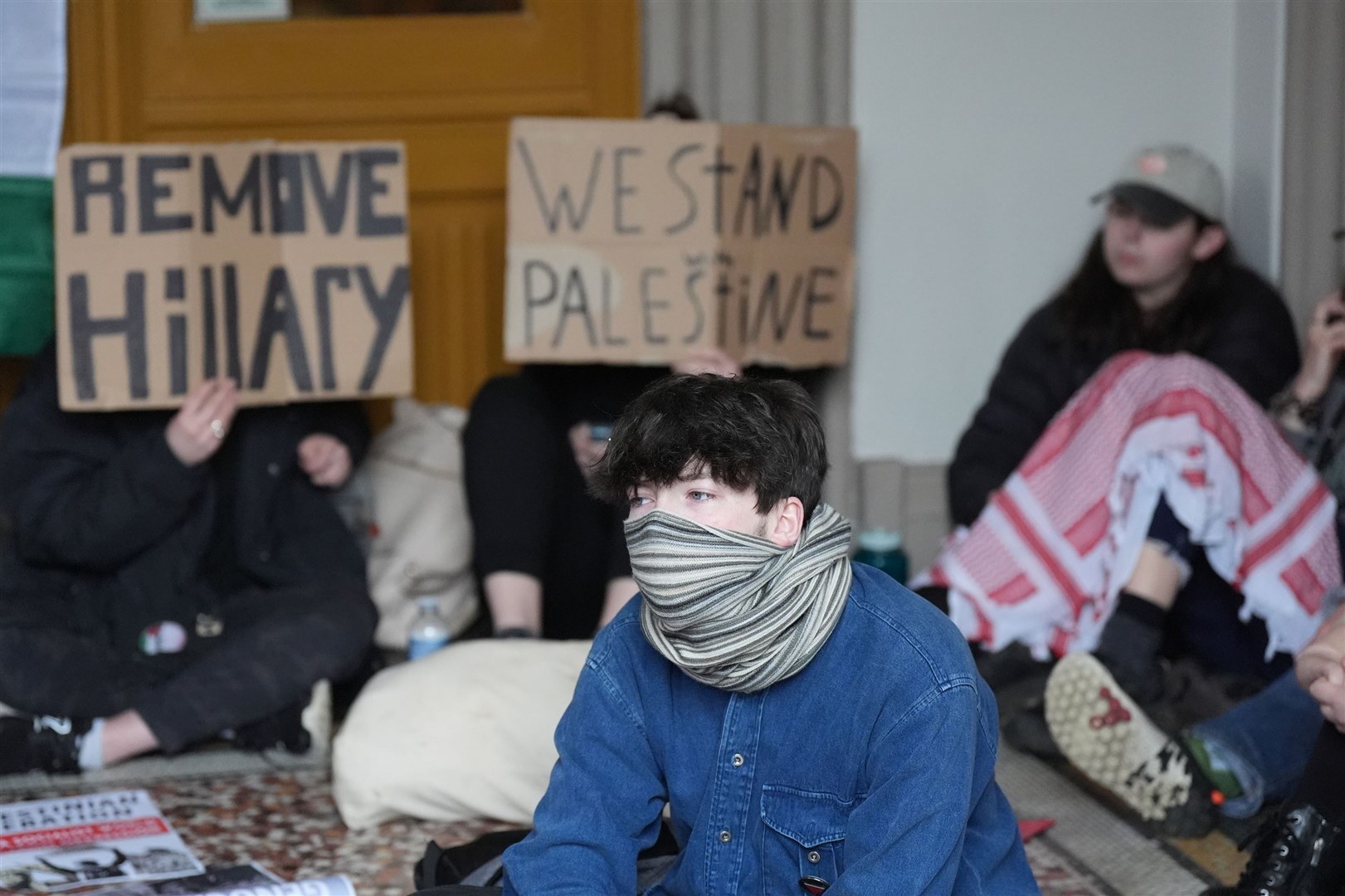 Members of the Queen’s University Belfast (QUB) Palestine Assembly hold a ‘sit in’ in the main Lanyon building of the campus (Niall Carson/PA)