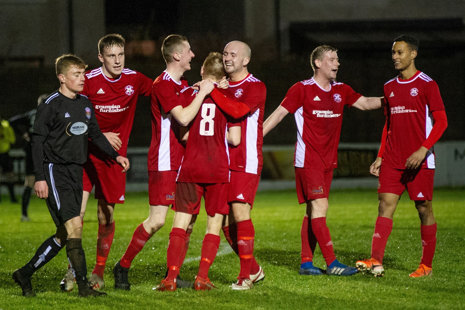 A number of Lossiemouth players, pictured here celebrating against Fort William, have signed contract extensions. Picture: Daniel Forsyth