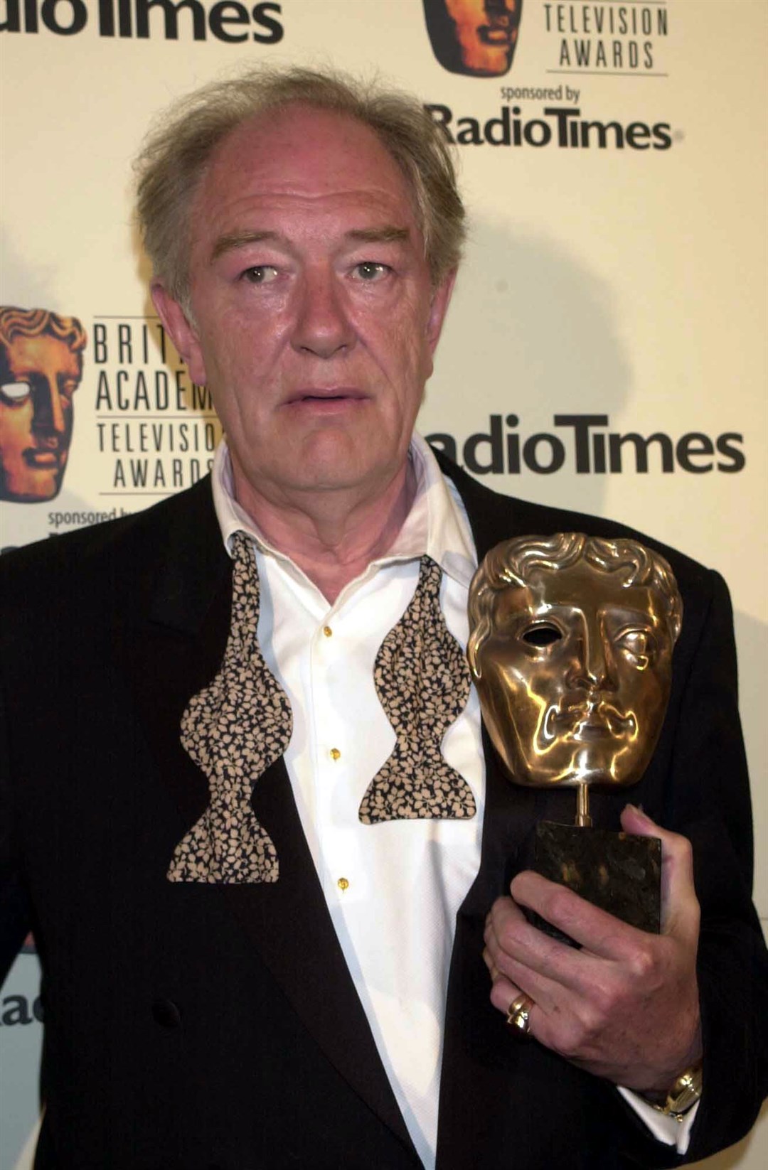 Actor Michael Gambon with the best actor award he received for Longitude (William Conran/PA)