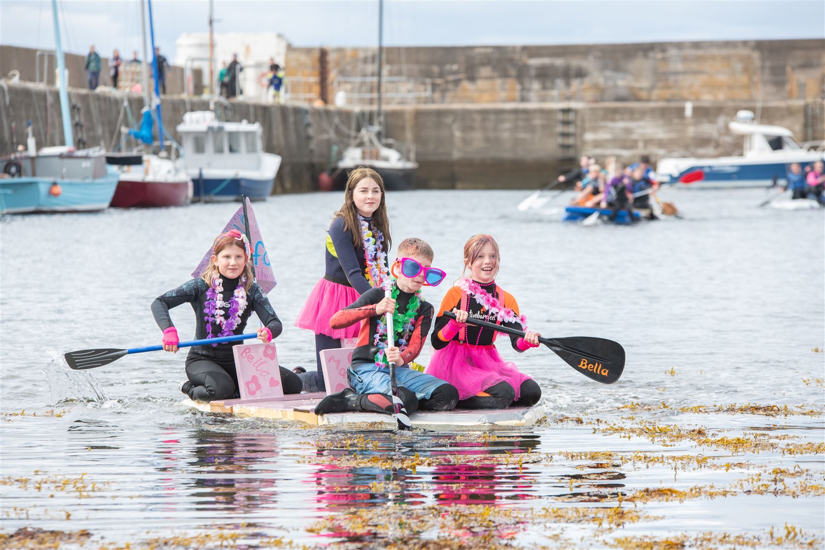 Winners of the raft race are 'The Fab Four' (from left) Bella Robertson, Merryn King, Mackintosh Ralph and Naomi Erker. Picture: Daniel Forsyth
