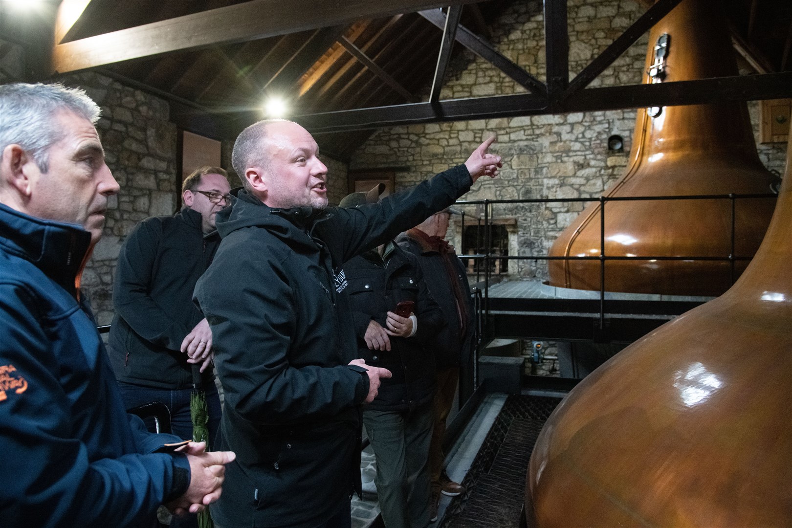 Manager Euan Henderson (centre) on a tour of the distillery...Picture: Daniel Forsyth..