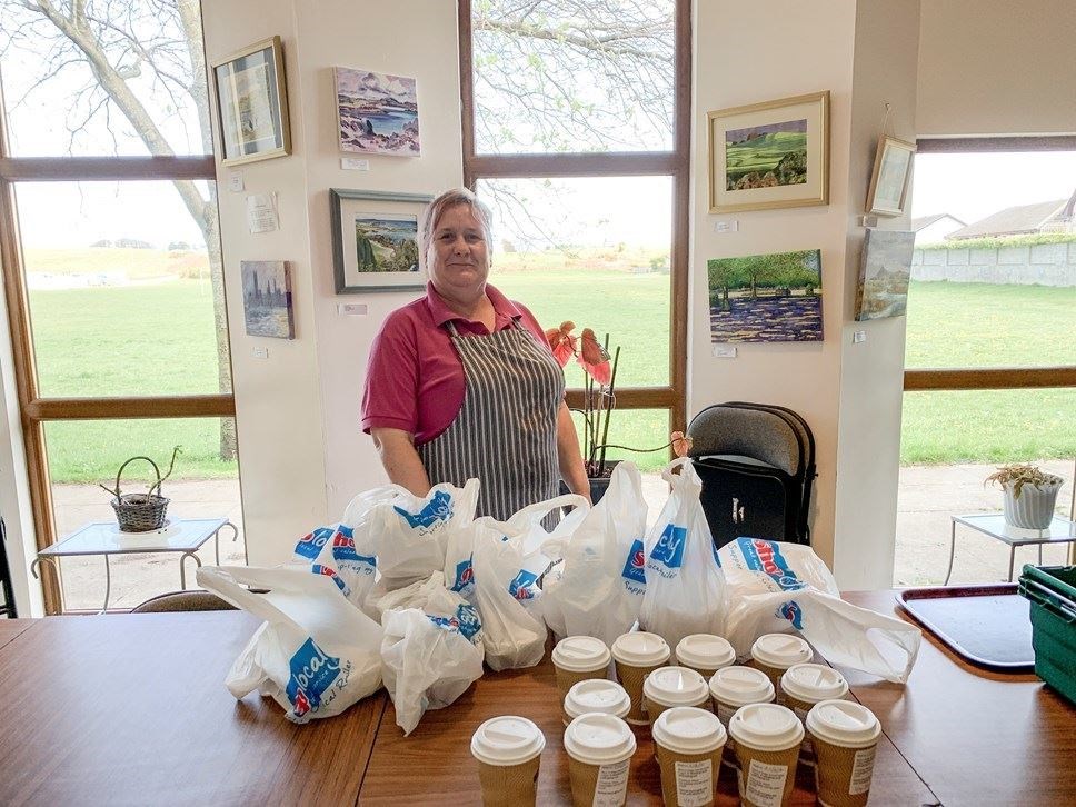 Helping those in need: Catering assistant Marie Fraser.