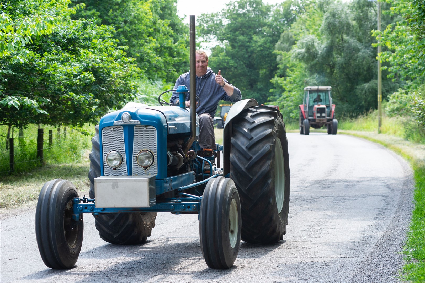 The tractor run approaches the A96 to the south of Newton...The Spey Valley Vintage Engine and Tractor Club enjoy a Sunday run with their tractors...Picture: Daniel Forsyth..