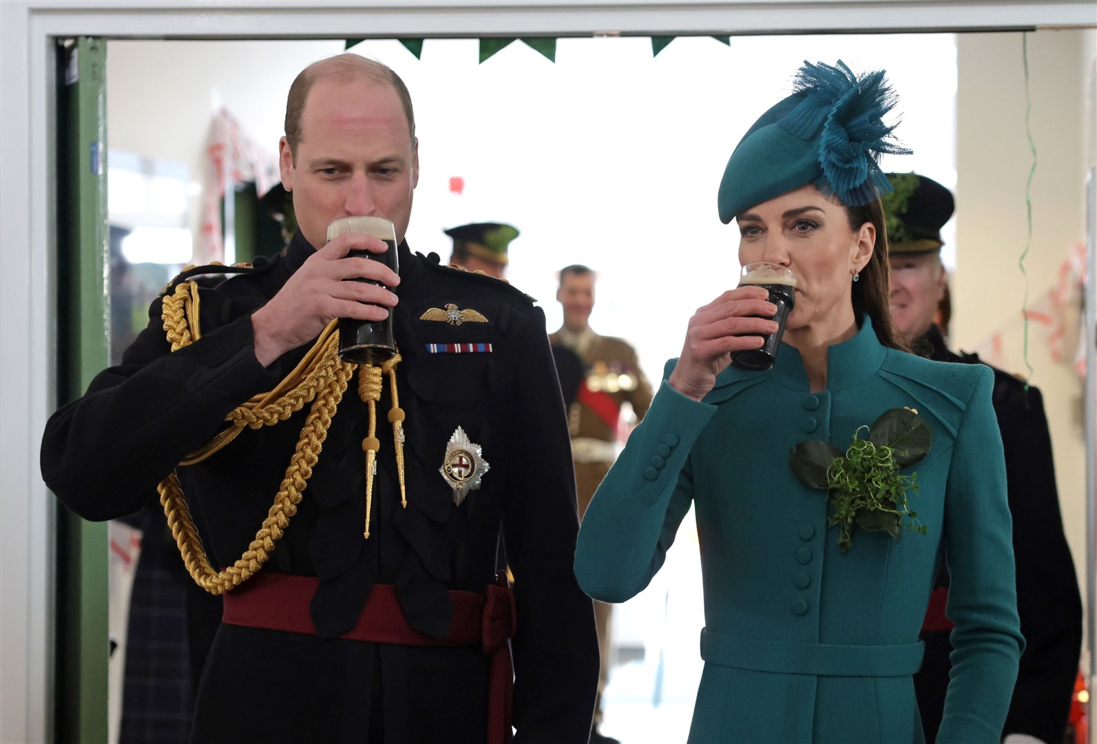 The Prince and Princess of Wales enjoy a glass of Guinness during a visit to the 1st Battalion Irish Guards for the St Patrick’s Day parade in 2023 (PA)
