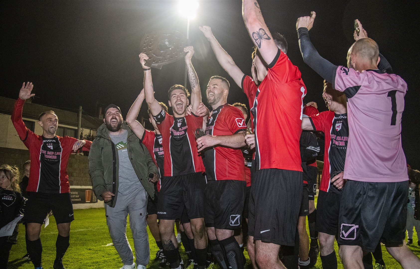 Party time for FC Fochabers after they secured a treble with a 3-1 win over Hopeman. Picture: Becky Saunderson