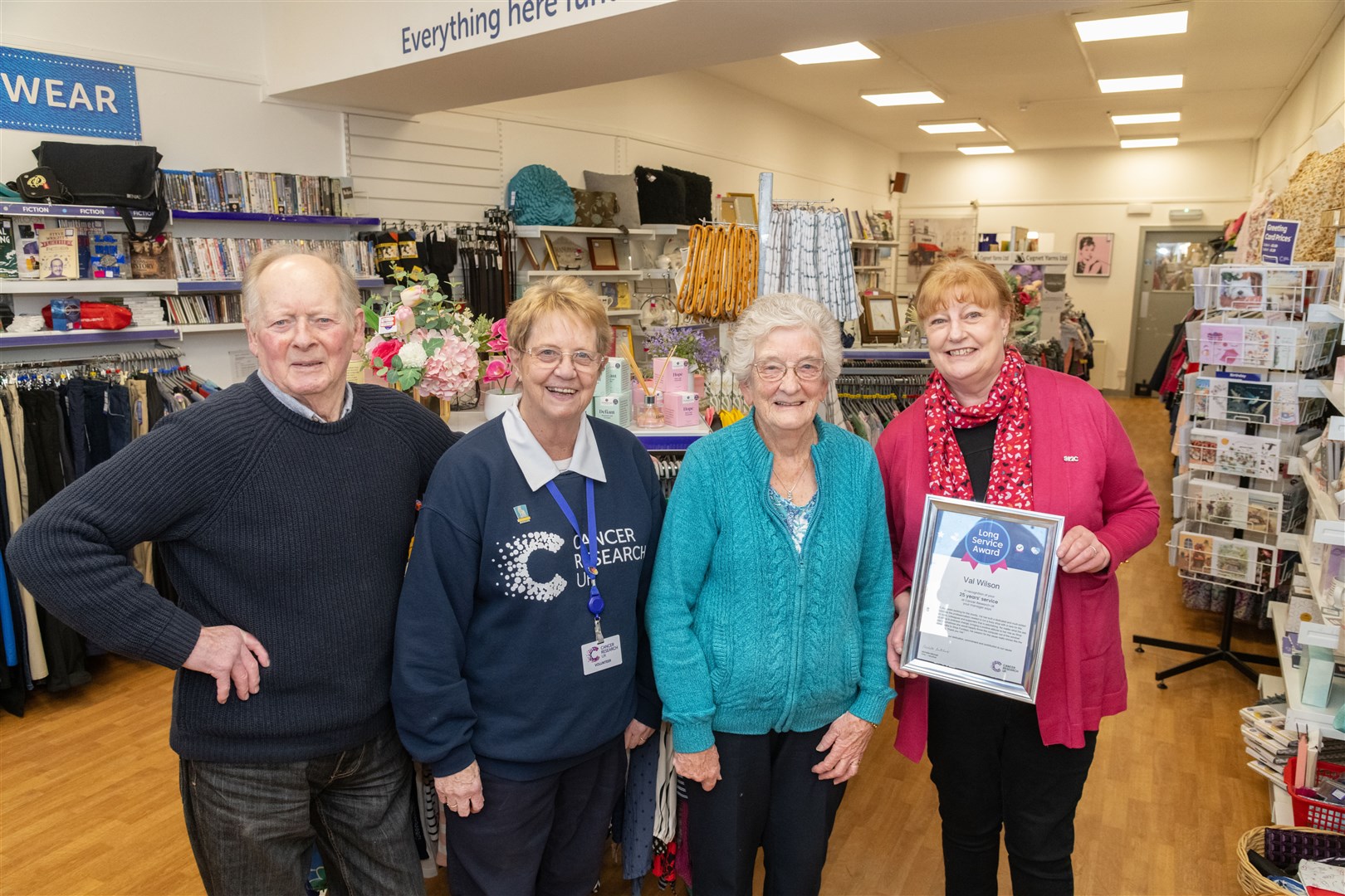 The Elgin team from left: John MacKintosh, Anne Rigg, Nan Cobban and Val Wilson...Val Wilson celebrates 25 years service at Cancer Research in Elgin...Picture: Beth Taylor.