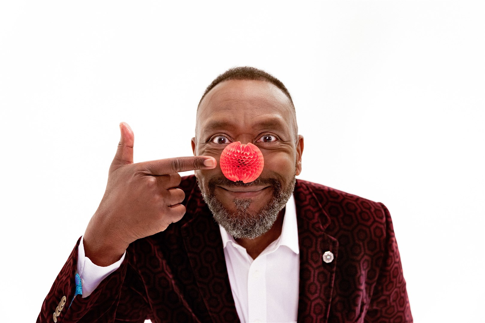 Sir Lenny Henry sporting the new transforming red nose, in support of Red Nose Day 2023 (Richard Davenport/Comic Relief/PA)
