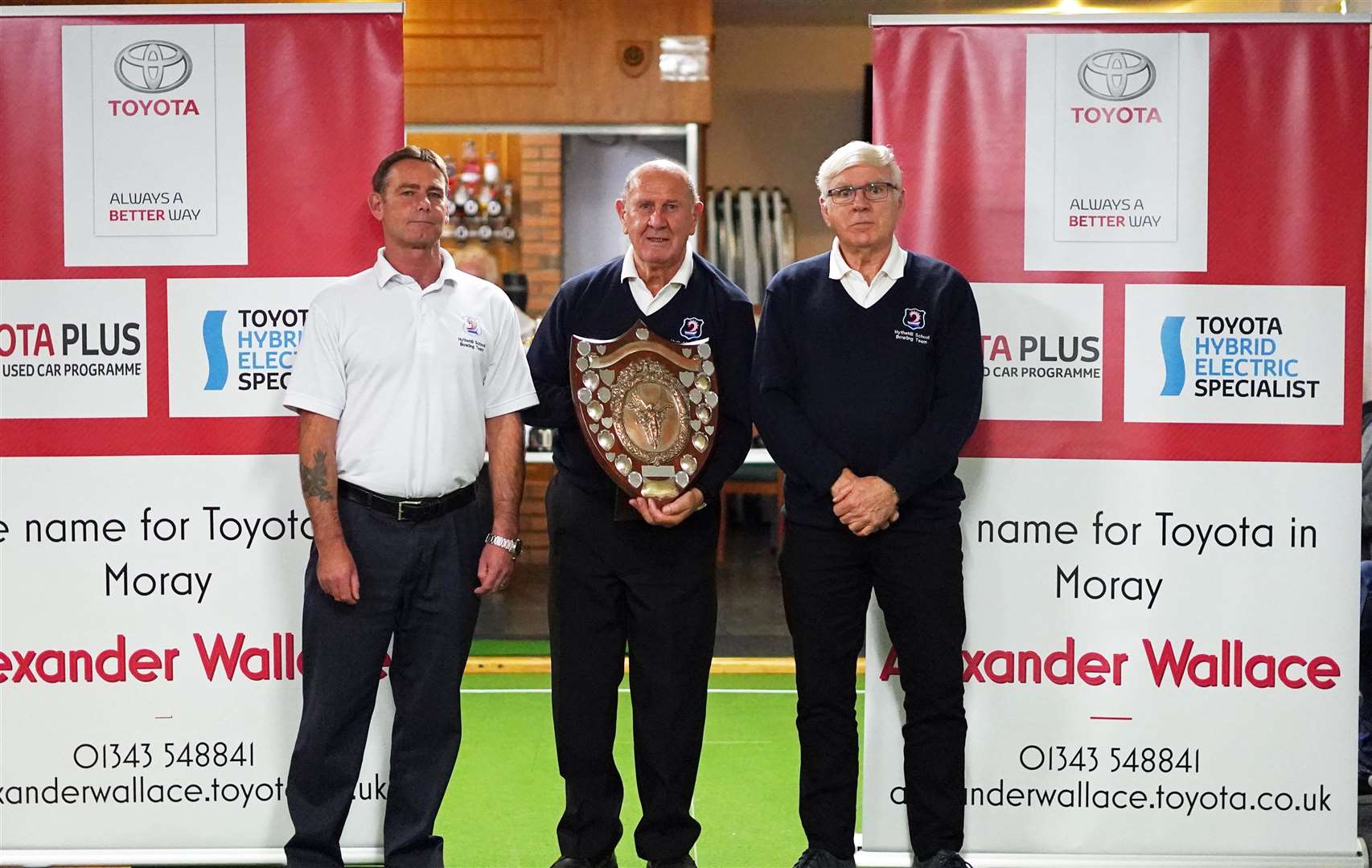 Lossiemouth won their first ever championship shield in the 19-20 season with Norman Grant pictured with the Division 2 trophy along with Kevin Donaldson (left) and Peter Bloomfield. Photo: Daph Bloomfield.