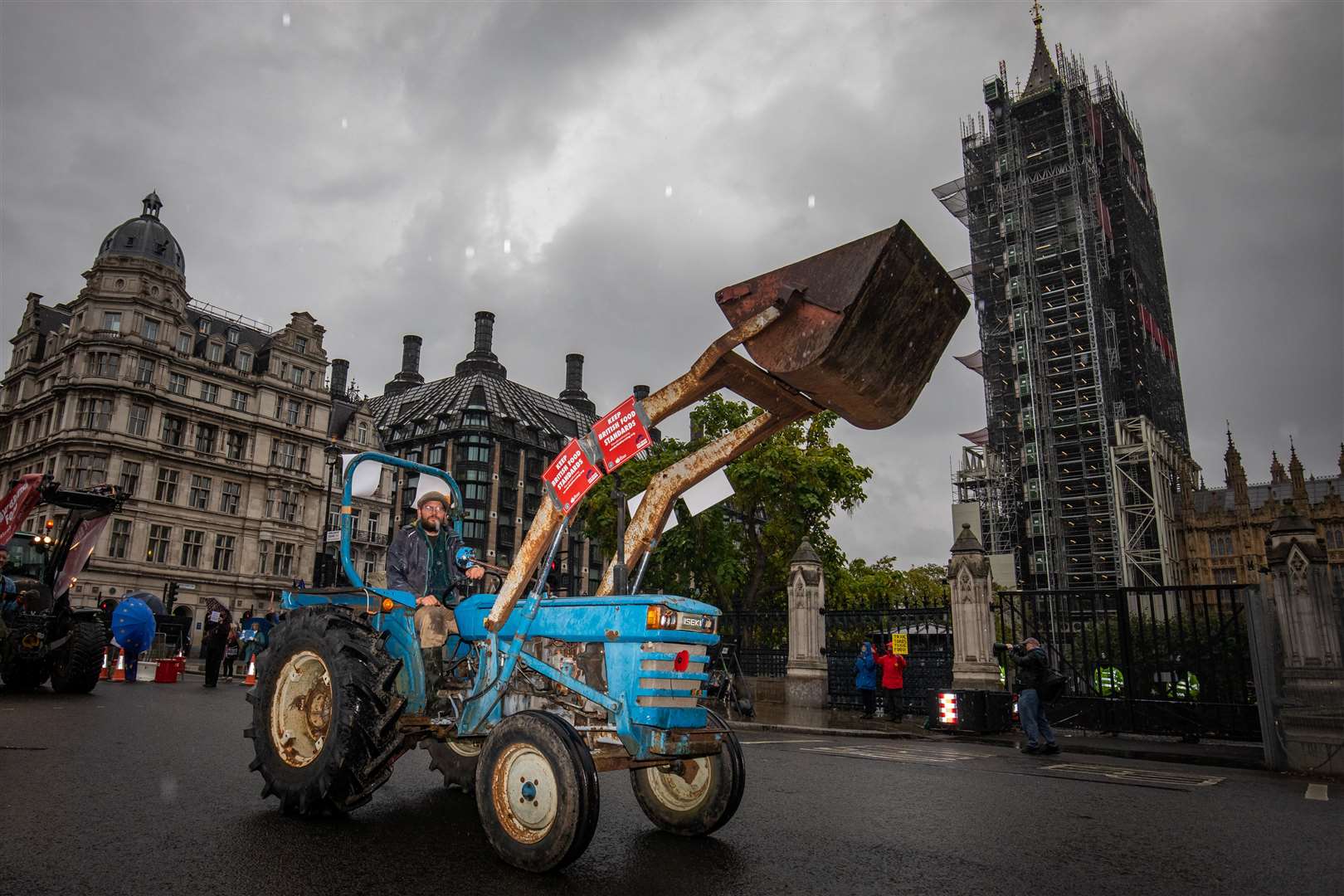 Farmers in tractors take part in a protest over food and farming standards, organised by Save British Farming, at Westminster, London (Aaron Chown/PA)