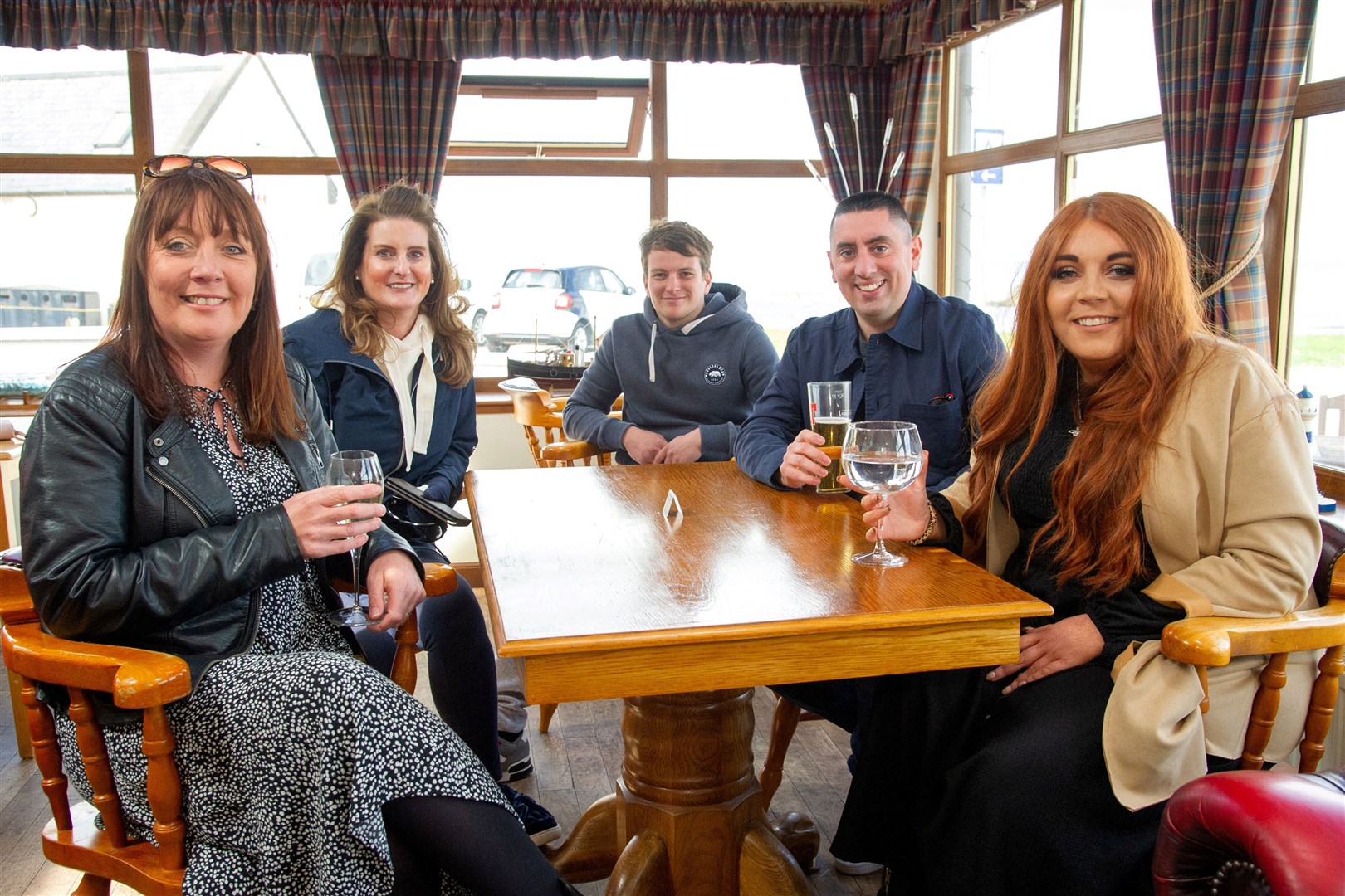 Left to Right: Donna Campbell, Sarah Morrison, Ross Morrison, Rory Fraser, Ashleigh Campbell enjoy a drink a good company at The Admirals Inn in Findochty. Picture: Daniel Forsyth