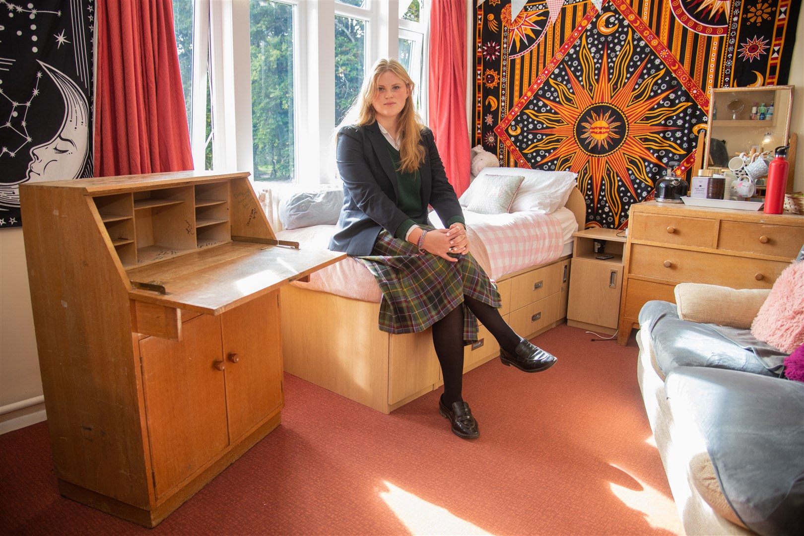 Amelia Rose-Bristow in her dormitory, which was formerly occupied by King Charles. Picture: Daniel Forsyth
