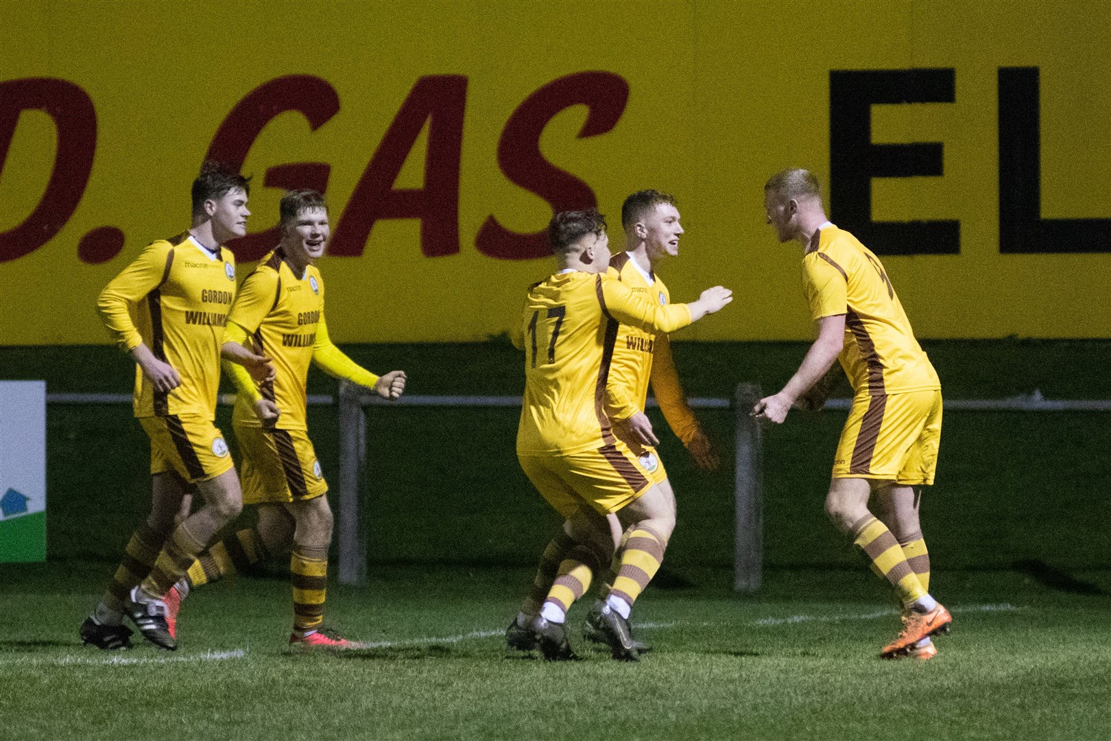 Forres' Lee Fraser wheels away to celebrate his late winner...Forres Mechanics FC (1) vs Lossiemouth FC (0) - Highland Fotball League 22/23 - Mosset Park, Forres 23/12/22...Picture: Daniel Forsyth..