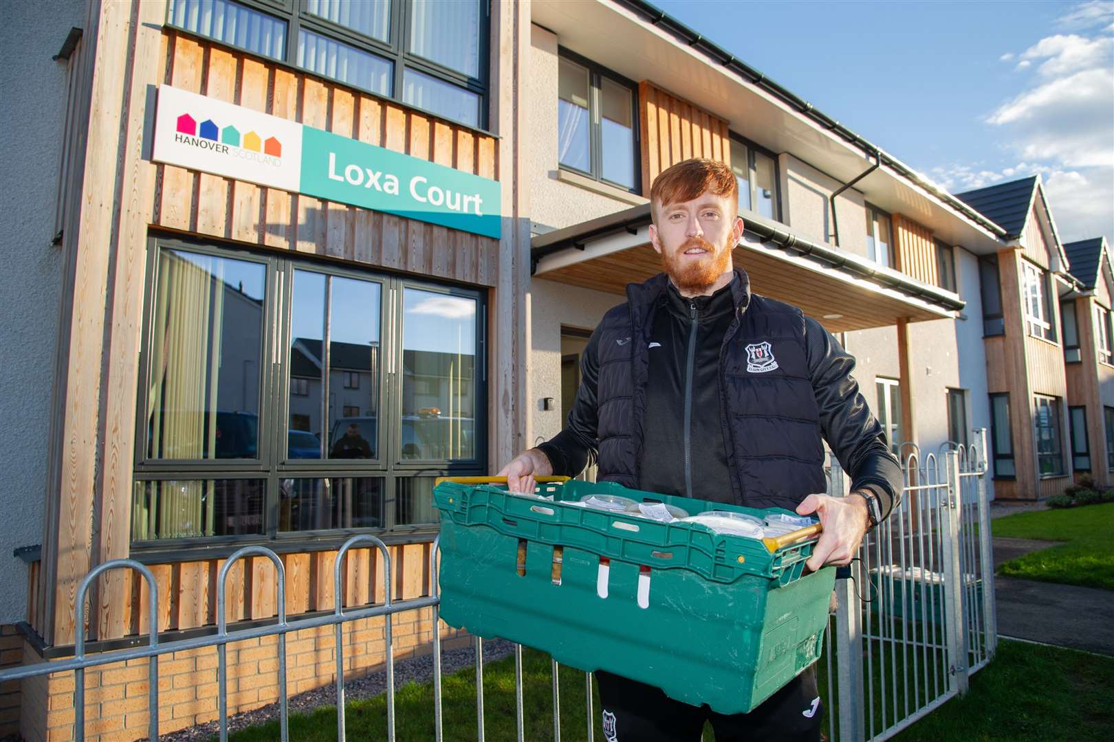 Elgin City goalkeeper Tom McHale delivers to Loxa Court in Elgin...Elgin City FC, along with TESCO Elgin and Guidi's in Lossiemouth, hand out 130 three course meals to sheltered housing in the community...Picture: Daniel Forsyth..