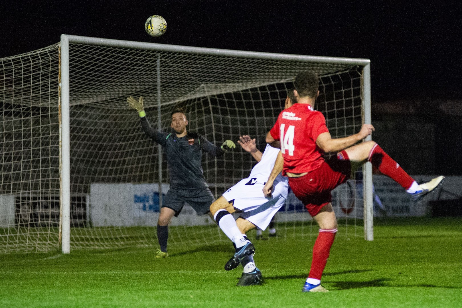 Lossiemouth midfielder Ryan Stuart watches his first half effort fly over the bar.