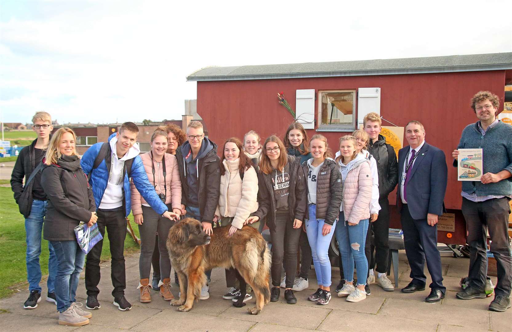 Pupils and staff from the Paul Pfinzing Gymnasium in Hersbruck outside the Welcome Hut at Lossiemouth High School, along with Councillor James Allan (second right) and PhD student Christian Hanser. Picture: P Bloomfield.