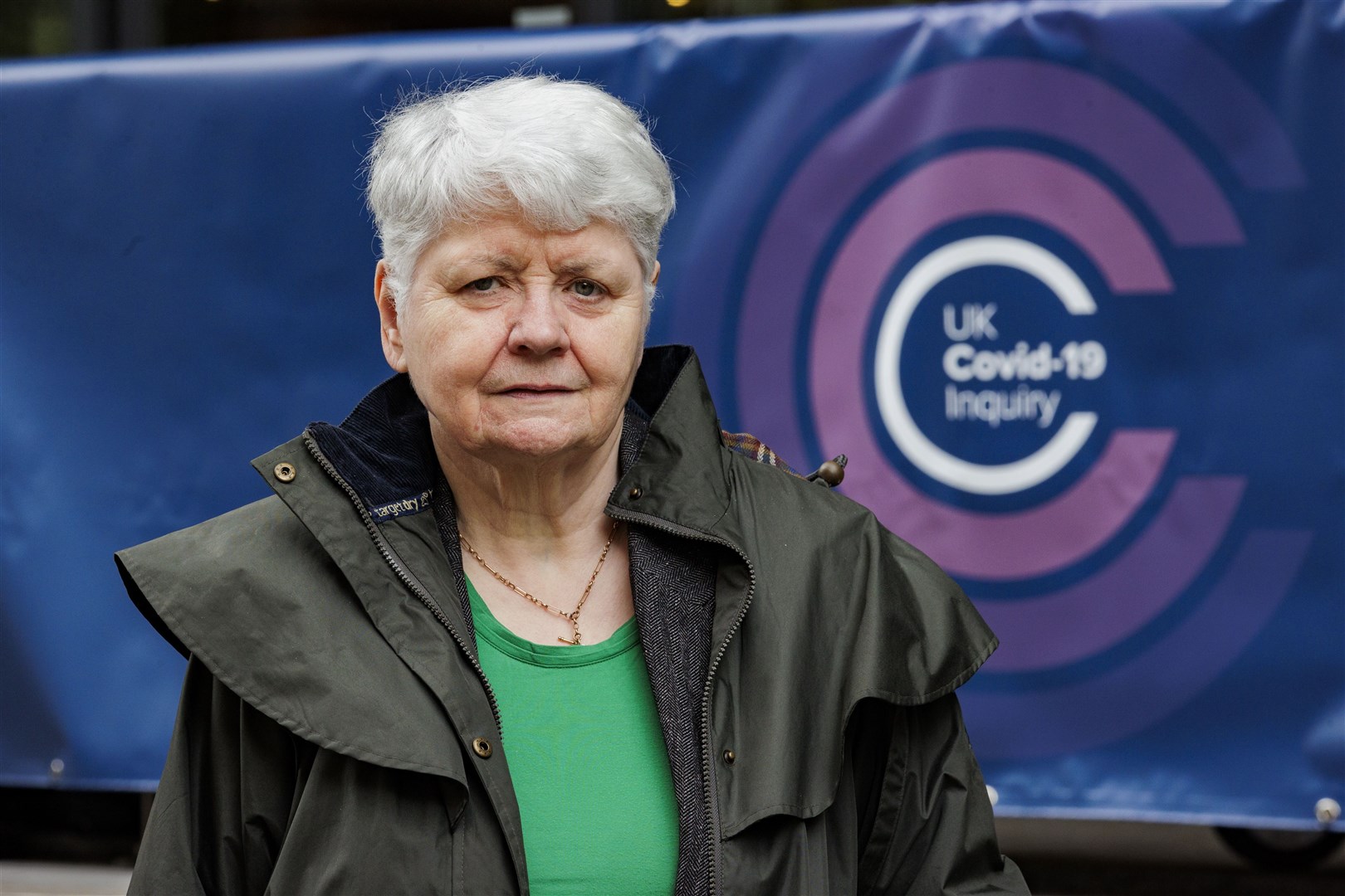 Marion Reynolds, a member of the Northern Ireland Covid Bereaved Families for Justice campaign group, outside the Clayton Hotel in Belfast (Liam McBurney/PA)