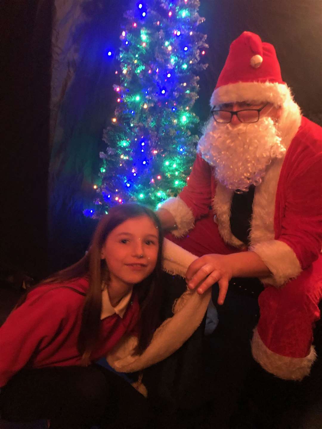 Santa Claus with Lynnie's daughter India Craig. Picture: Graham Cormie