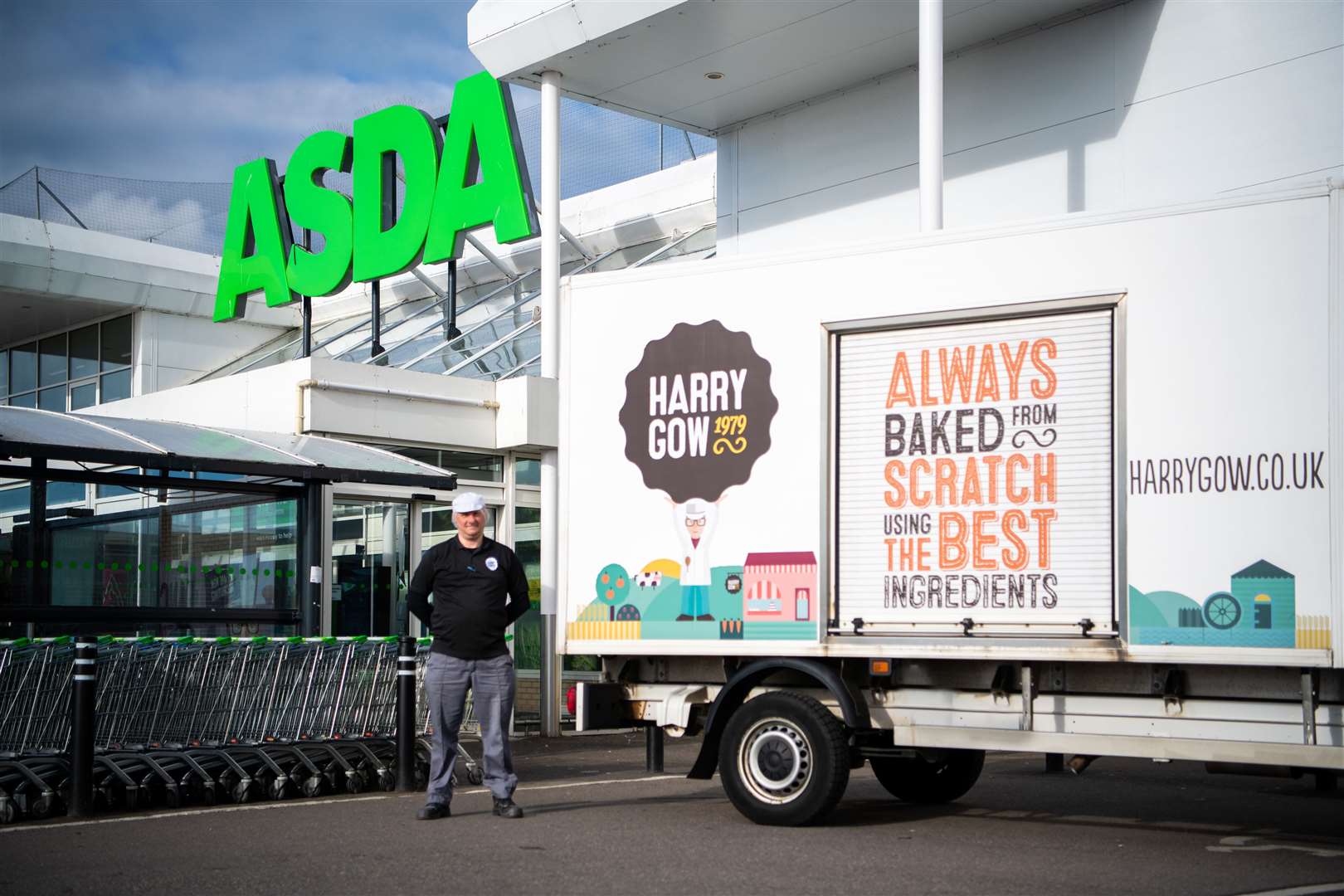 Harry Gow driver Steven Martin delivers the first batch of cakes to the Asda Elgin branch.