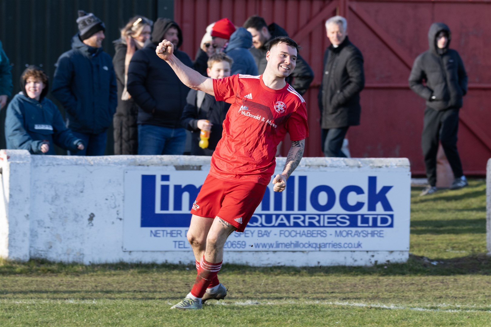 Lossie's Niall Kennedy celebrating after his successful penalty. ..Lossiemouth F.C. v Turriff United F.C. at Grant Park...Picture: Beth Taylor.