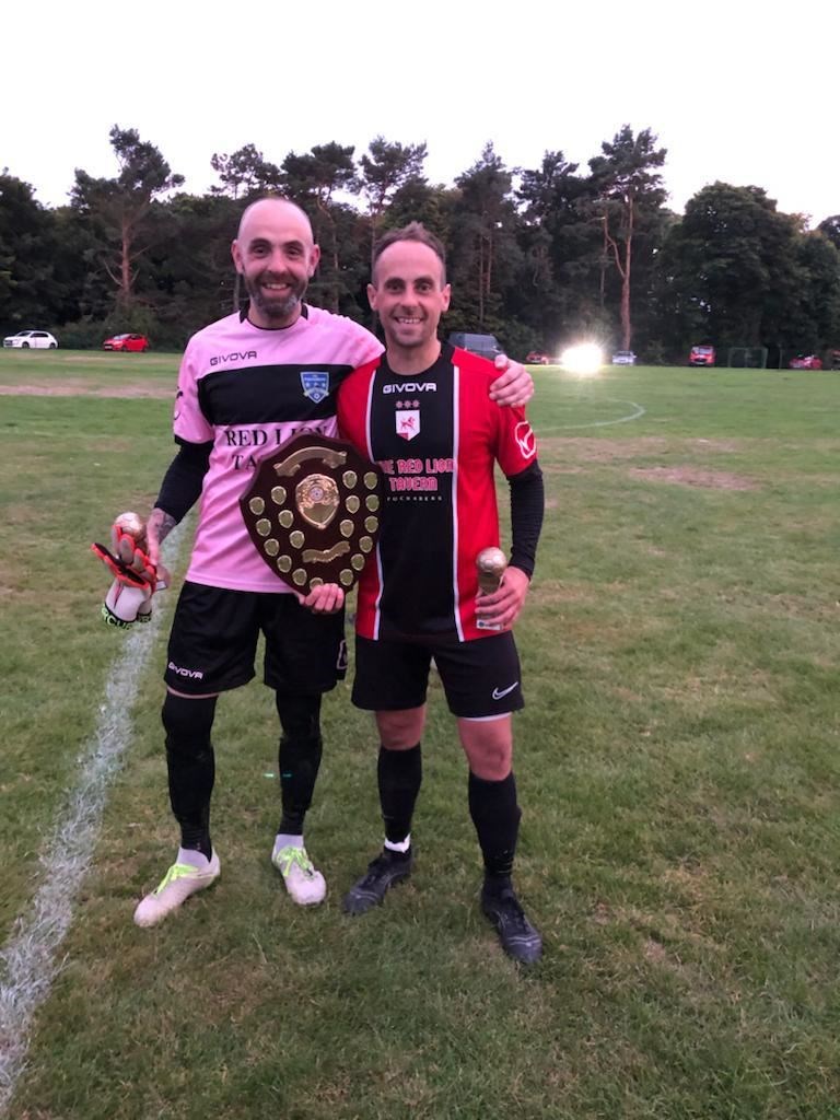 Brothers in arms: Kieran (left) and Gary Burchell celebrate the title success.