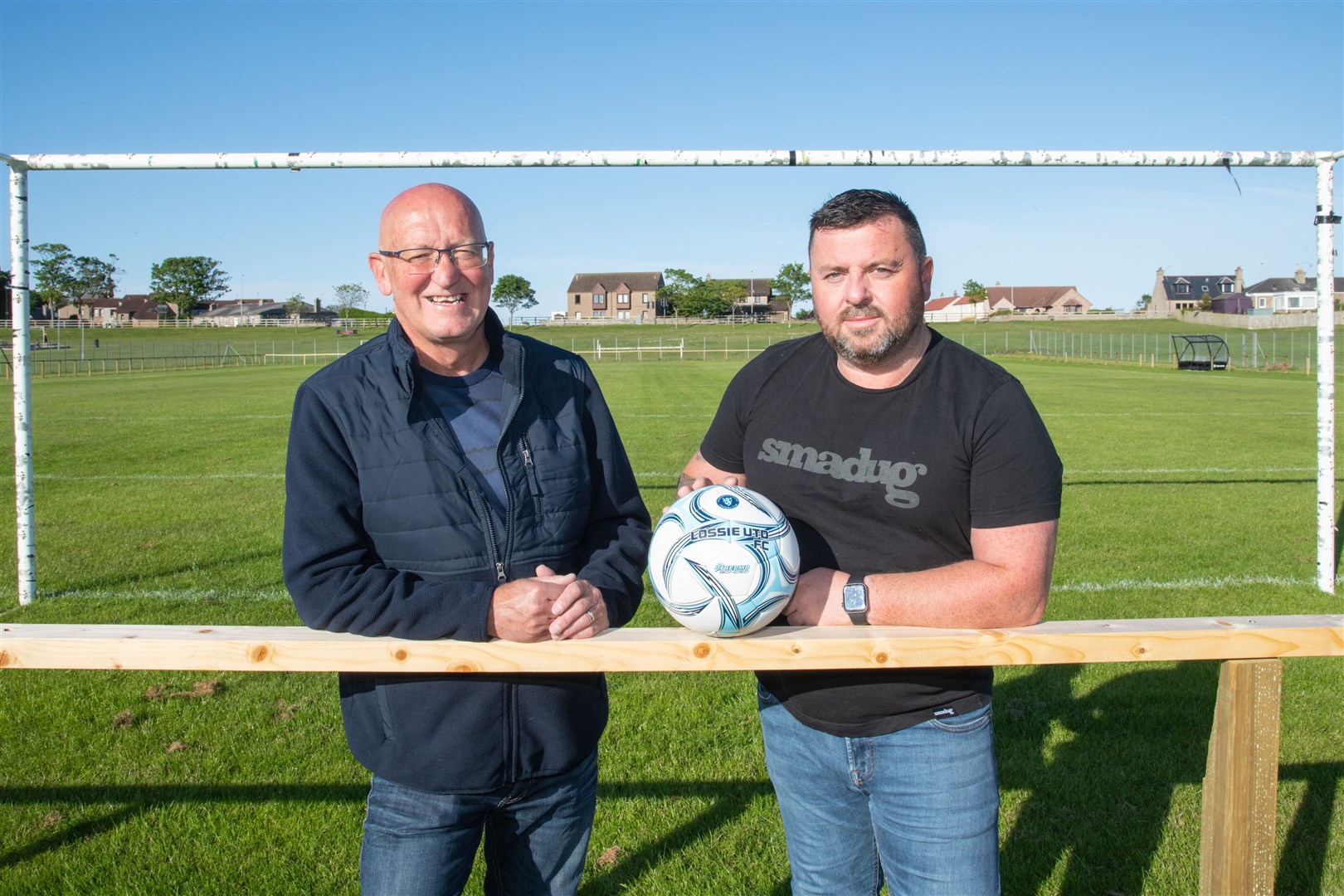 New chairman Alex Lauriston (right) with former Highland League legend Fraser Kellas who are spearheading Lossiemouth united's return to the north junior football ranks. Picture: Daniel Forsyth