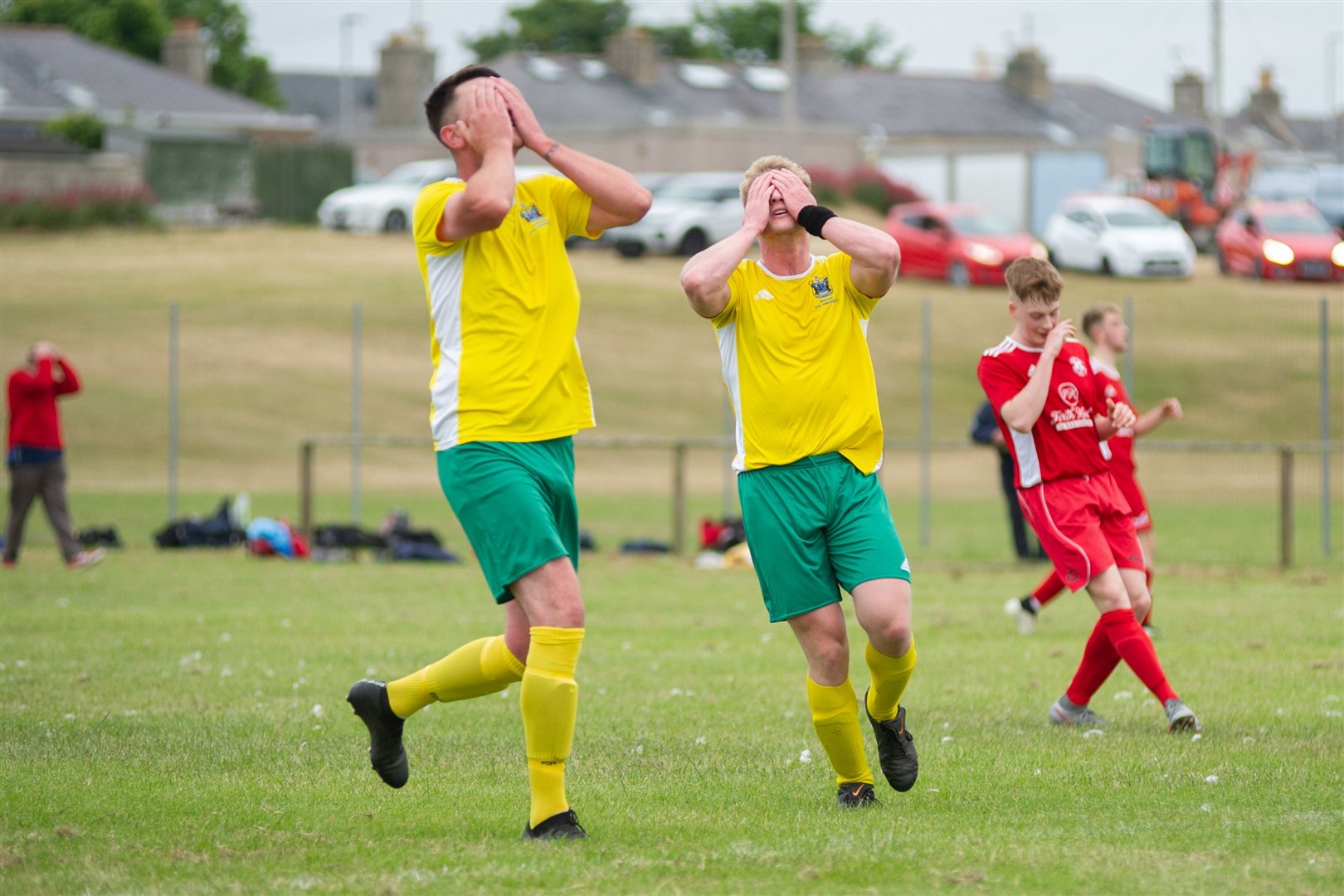 I can't believe we missed! David McNamara and Blair Tulloch are united in despair after a Hopeman chance goes abegging. .Picture: Daniel Forsyth..