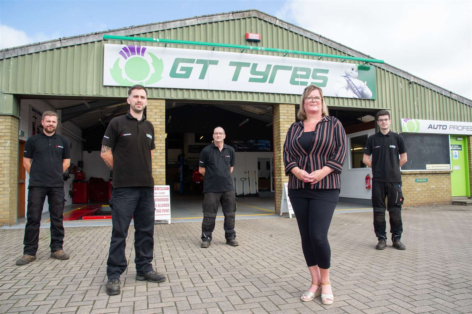 (From left) GT Tyres staff Danny Stewart, George Cameron, Gary Black, Wendy Hay and Allan Black at the Forres workshop. Picture: Daniel Forsyth.