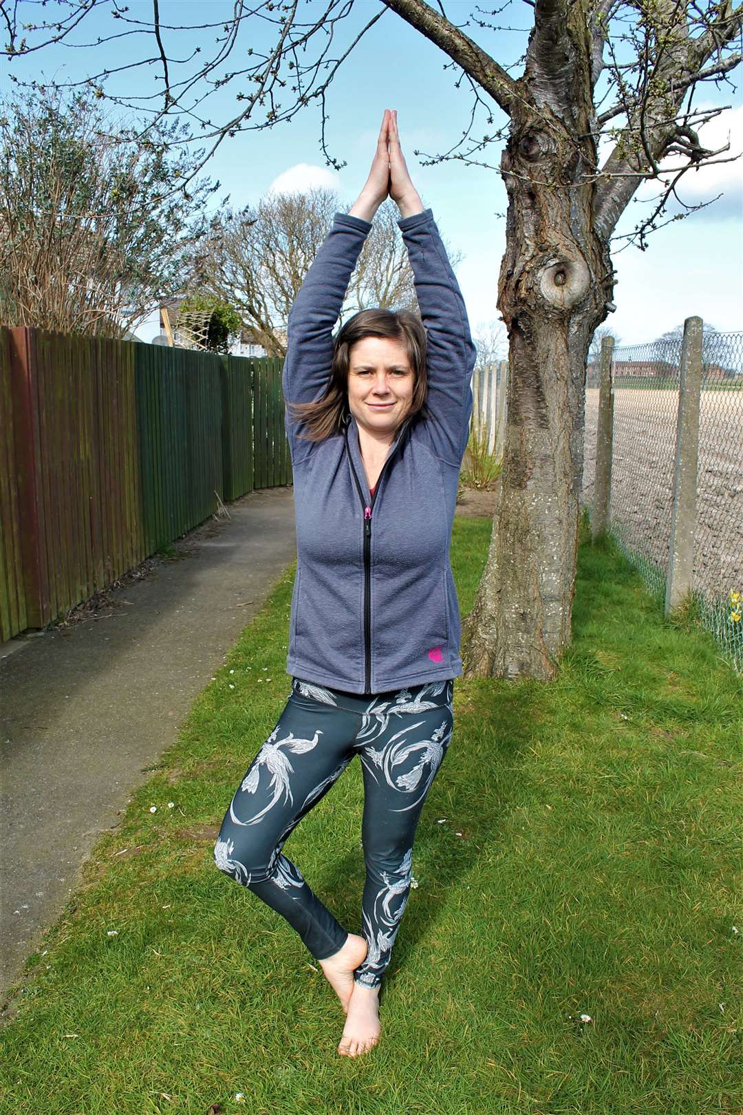 Osteopath Bryony Richardson doing yoga at home in Kinloss.