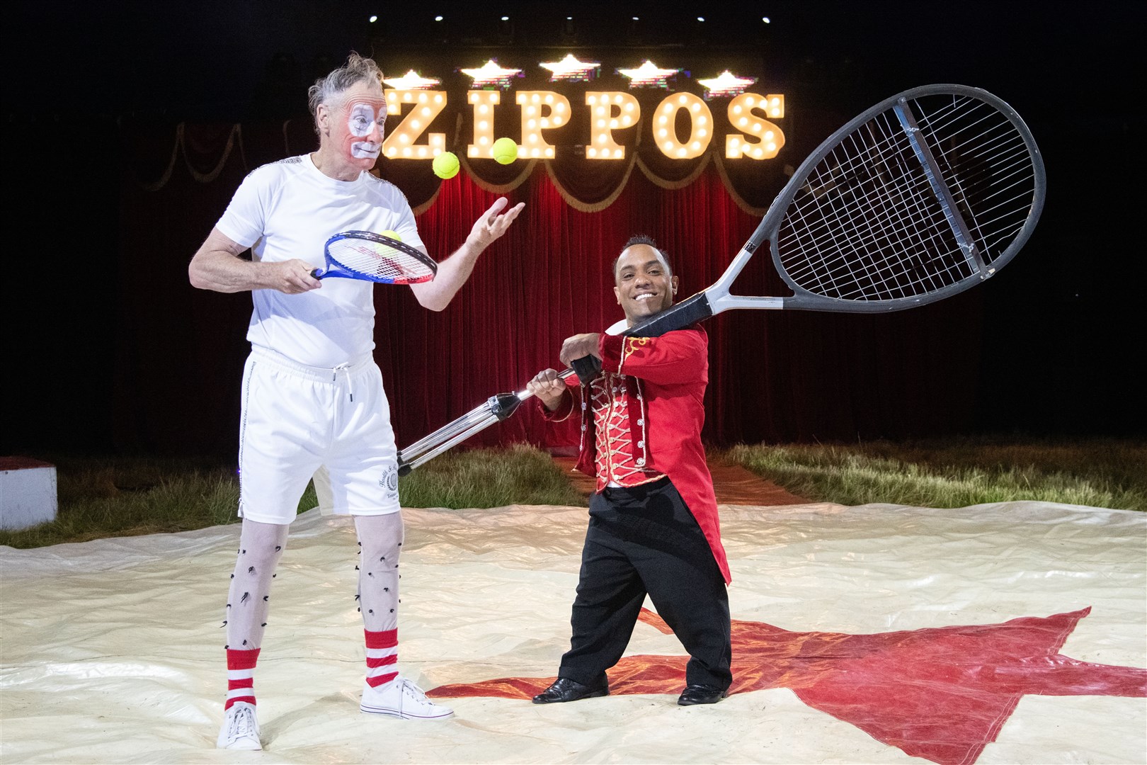 Anyone for tennis? Whimmy Walker and Paulo dos Santos have some fun. Picture: Daniel Forsyth