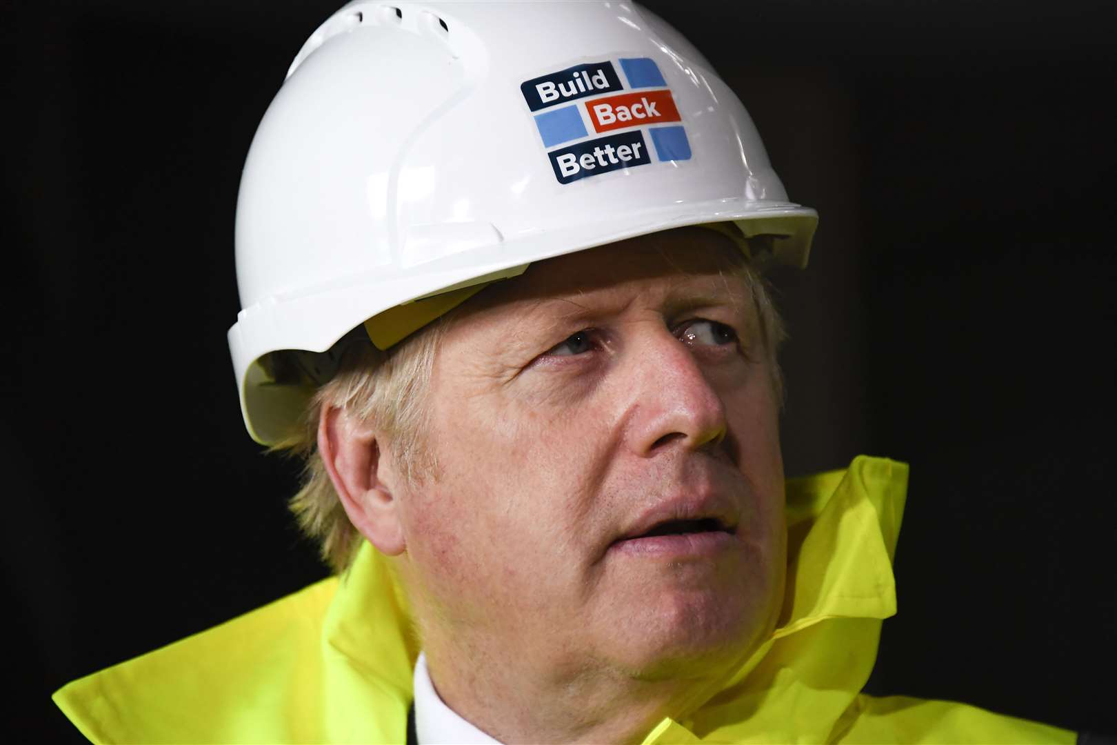 Boris Johnson visiting a construction site (Alberto Pezzali/PA)