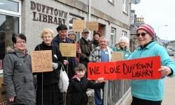 Debbie Moir (right) along with just some of the protestors who gathered at Dufftown Library as part of a protest this week.