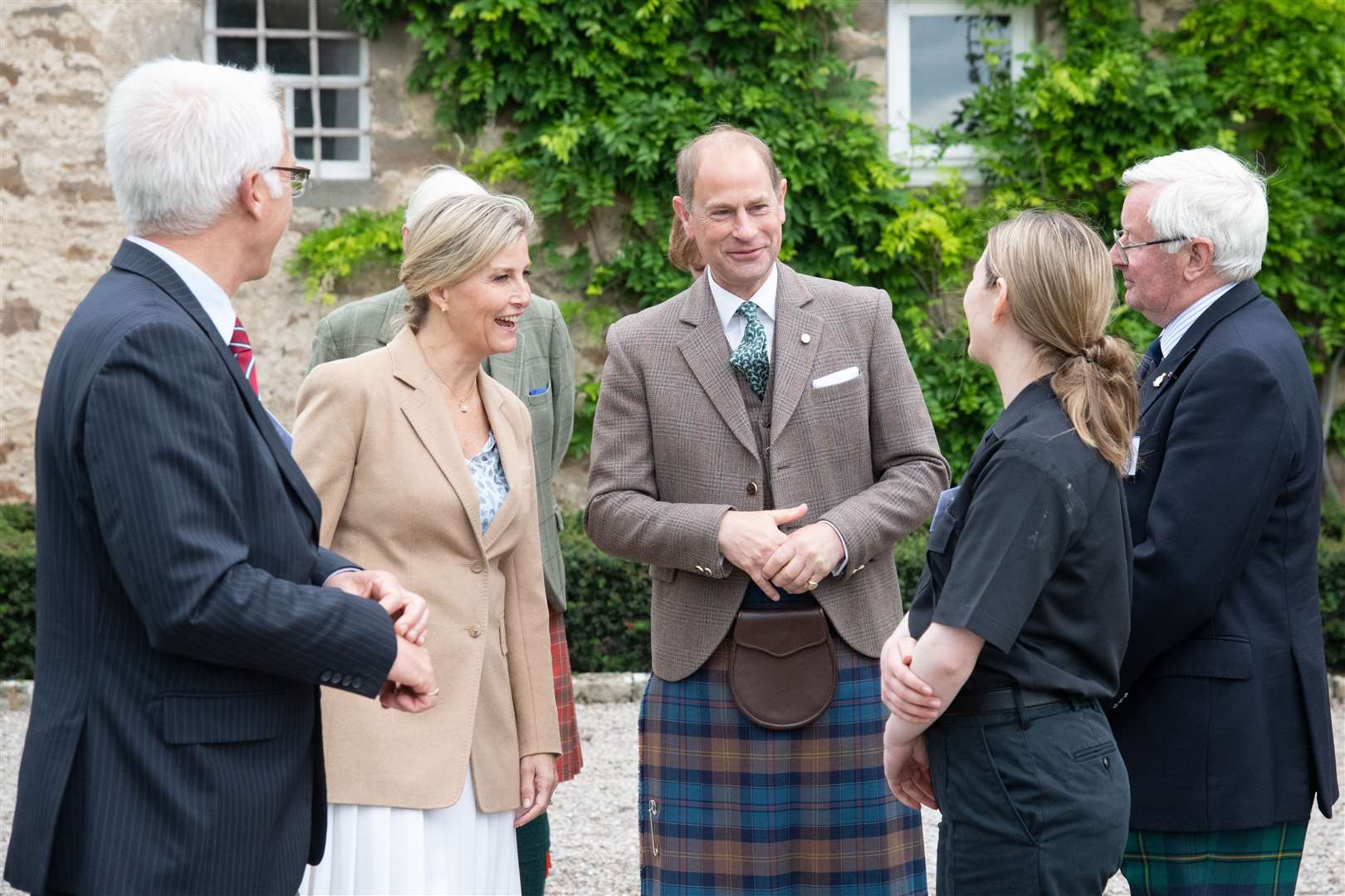 The Earl and Countess are met by Richard Devey (left), Fadheela Redpath (second right) and Grenville Johnston (right)...Prince Edward and Sophie, known as the Earl and Countess of Forfar when visiting Scotland, spend time at Gordonstoun School during their visit to Moray...Picture: Daniel Forsyth..