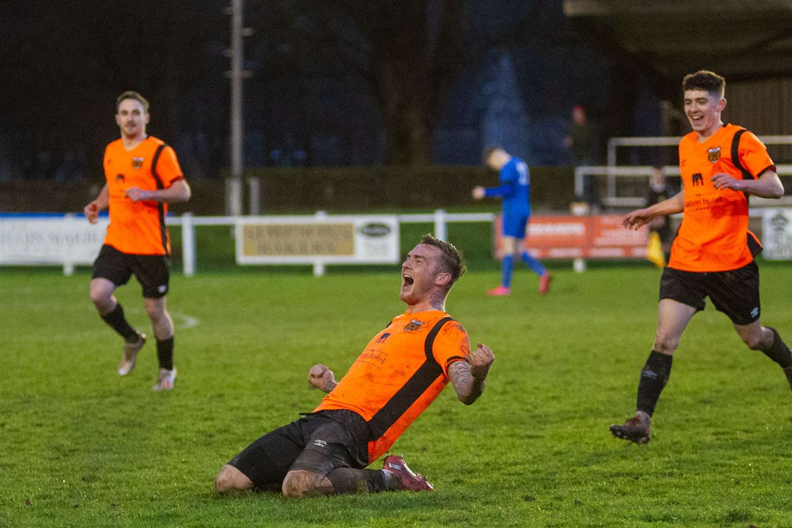 Darryl McHardy celebrates his stoppage time winner for Rothes. Picture: Daniel Forsyth.